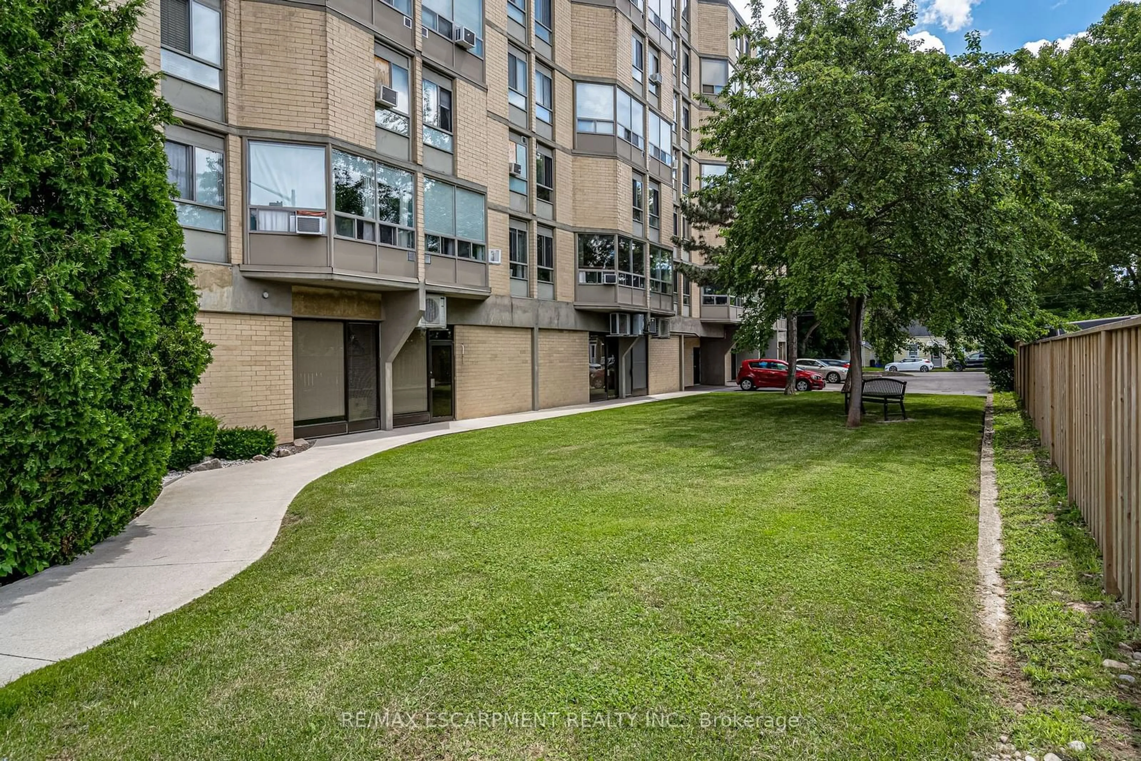 A pic from outside/outdoor area/front of a property/back of a property/a pic from drone, street for 10 John St #209, Hamilton Ontario L9H 6J3