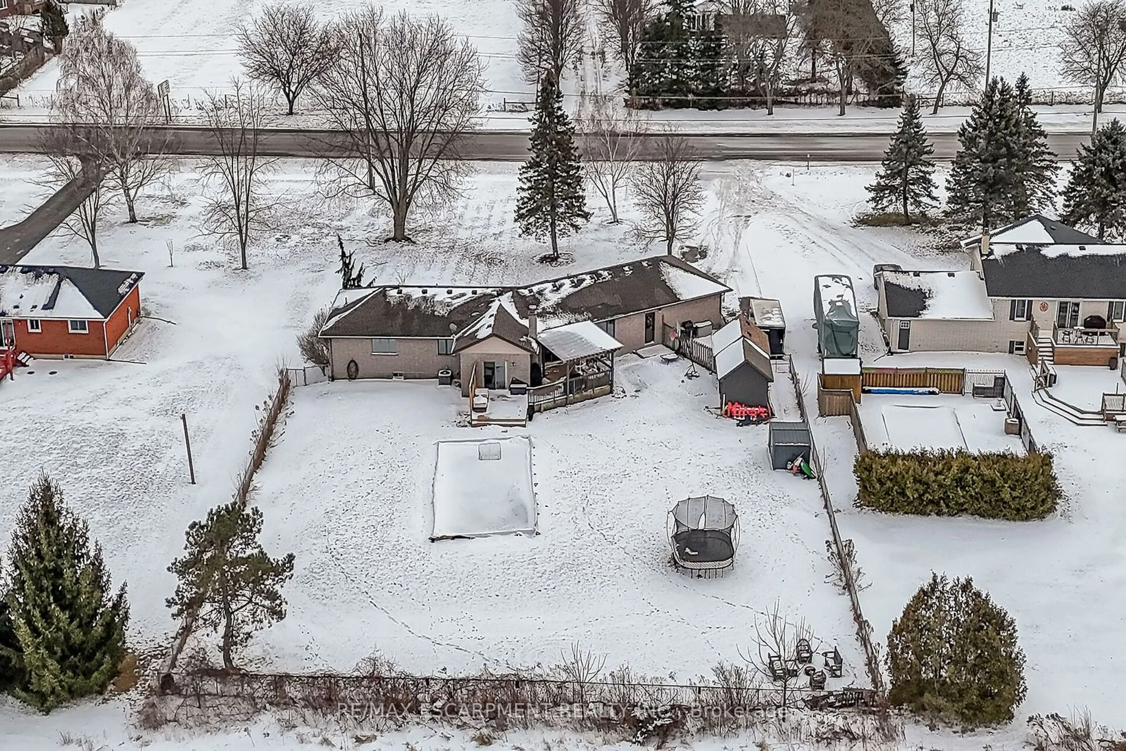 A pic from outside/outdoor area/front of a property/back of a property/a pic from drone, street for 653 Highway 6, Norfolk Ontario N0A 1N2