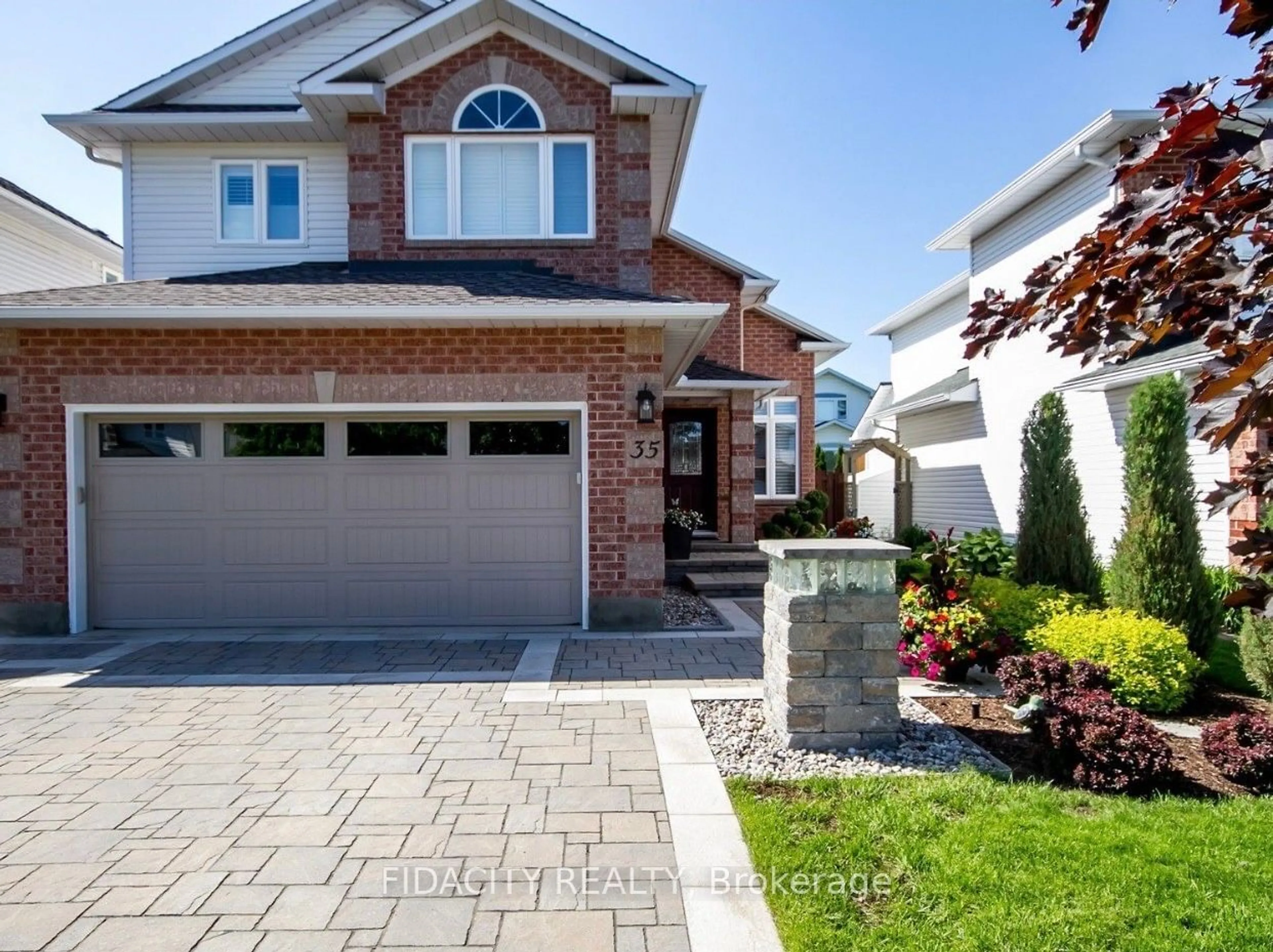 Home with brick exterior material, street for 35 Steggall Cres, Stittsville - Munster - Richmond Ontario K2S 1S4