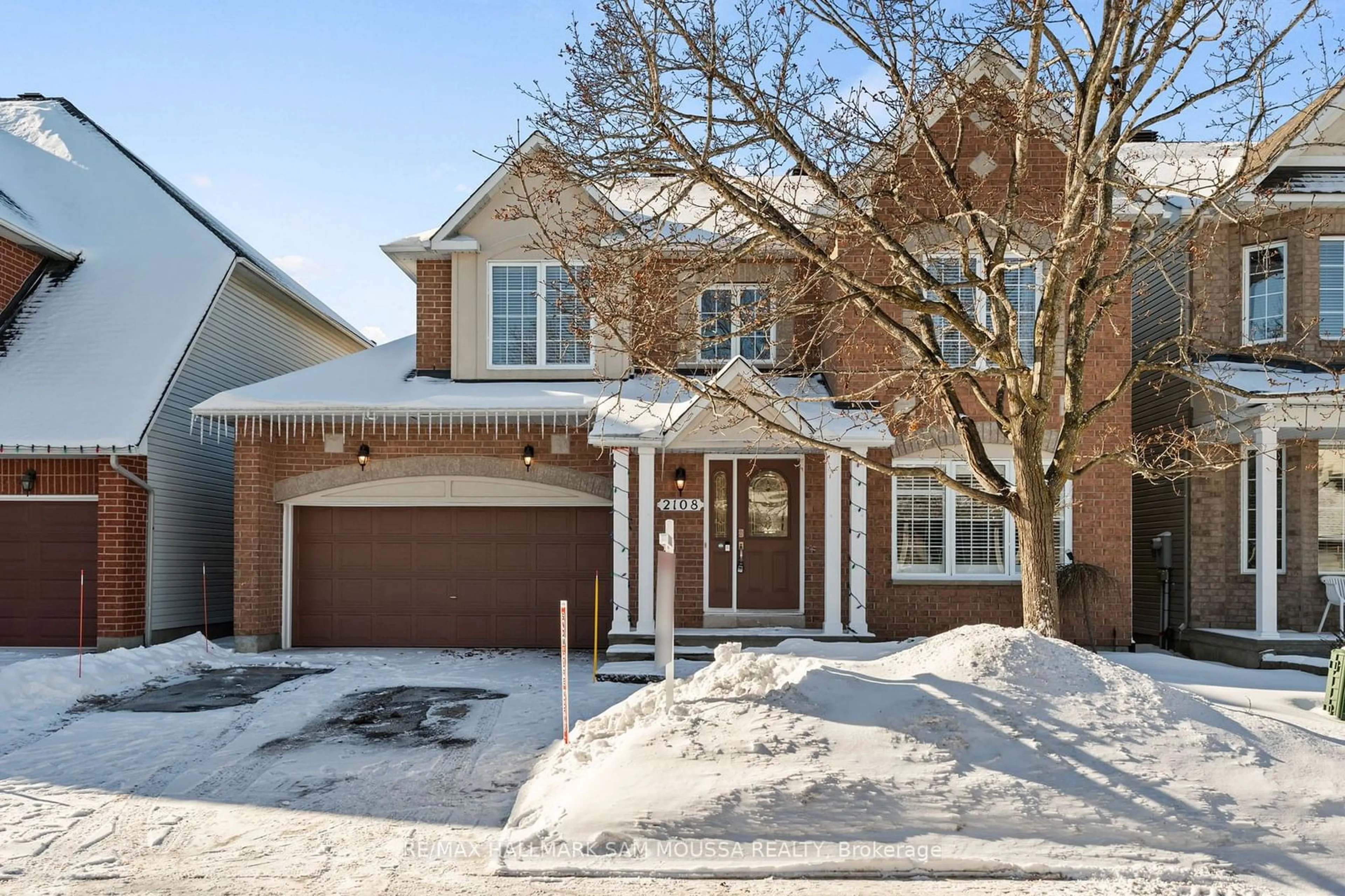 Home with brick exterior material, street for 2108 Blue Willow Cres, Orleans - Convent Glen and Area Ontario K1W 1K3