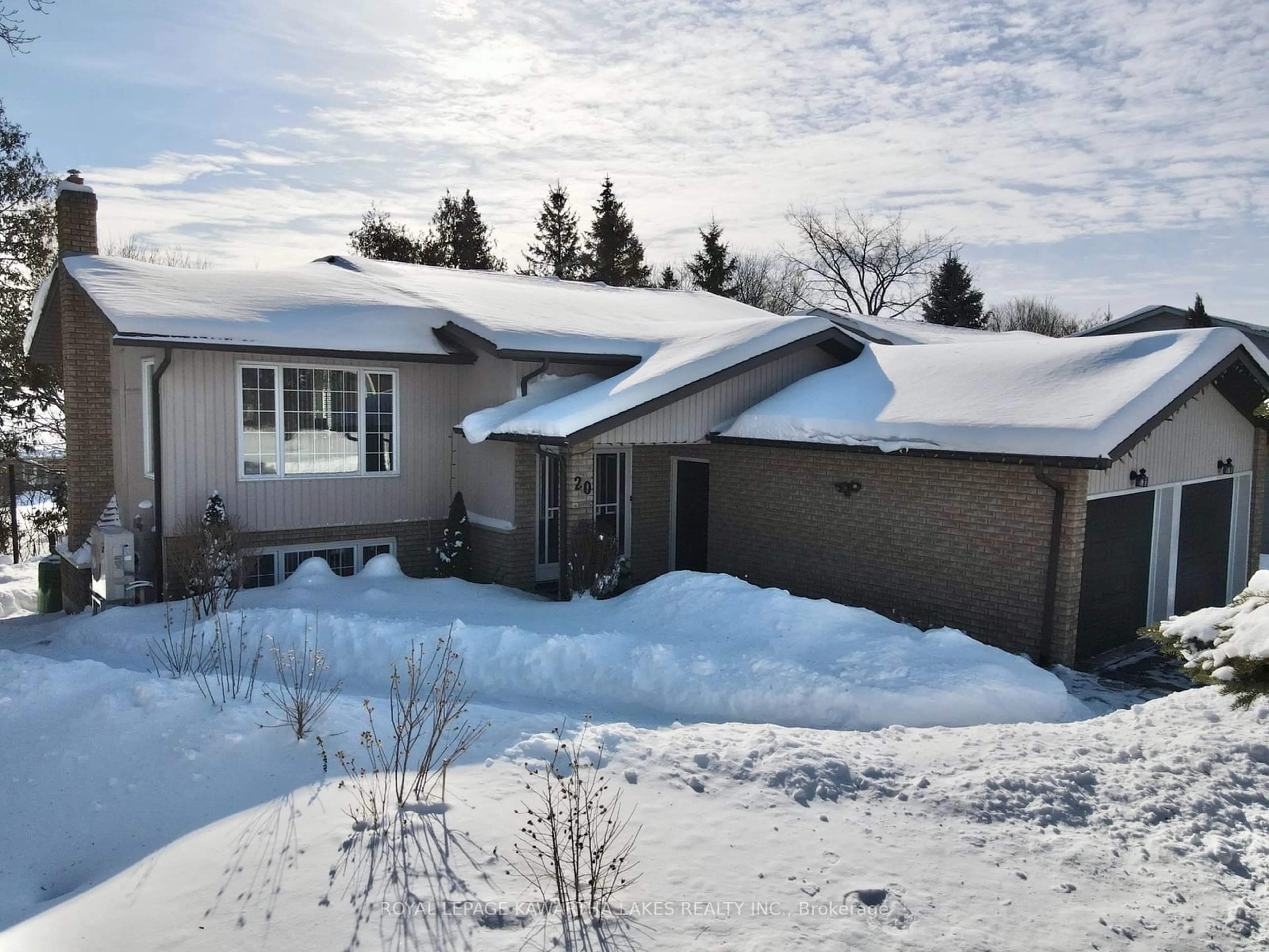 A pic from outside/outdoor area/front of a property/back of a property/a pic from drone, street for 20 Cedartree Lane, Kawartha Lakes Ontario K0M 1A0