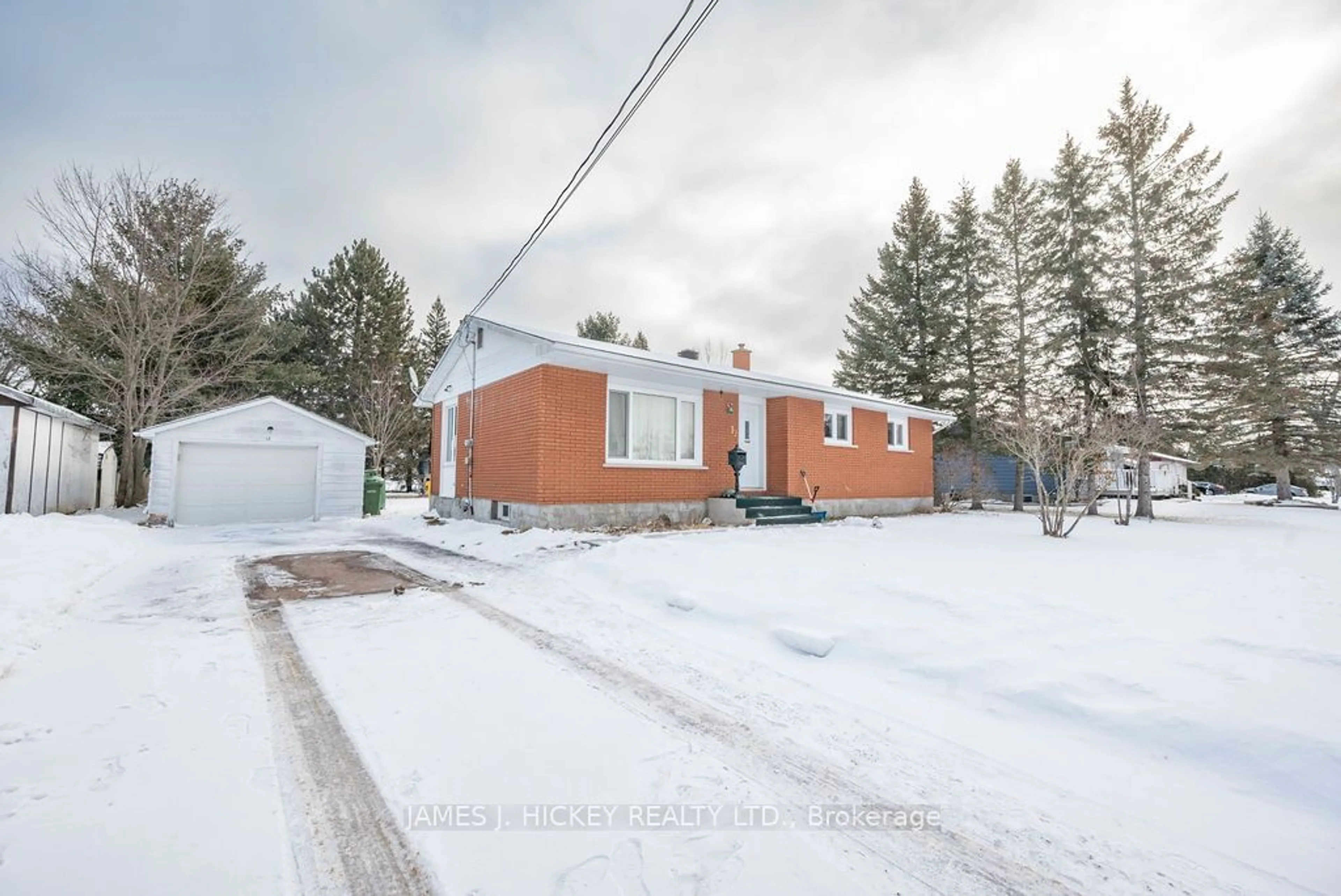 A pic from outside/outdoor area/front of a property/back of a property/a pic from drone, street for 12 William St, Petawawa Ontario K8H 2K4