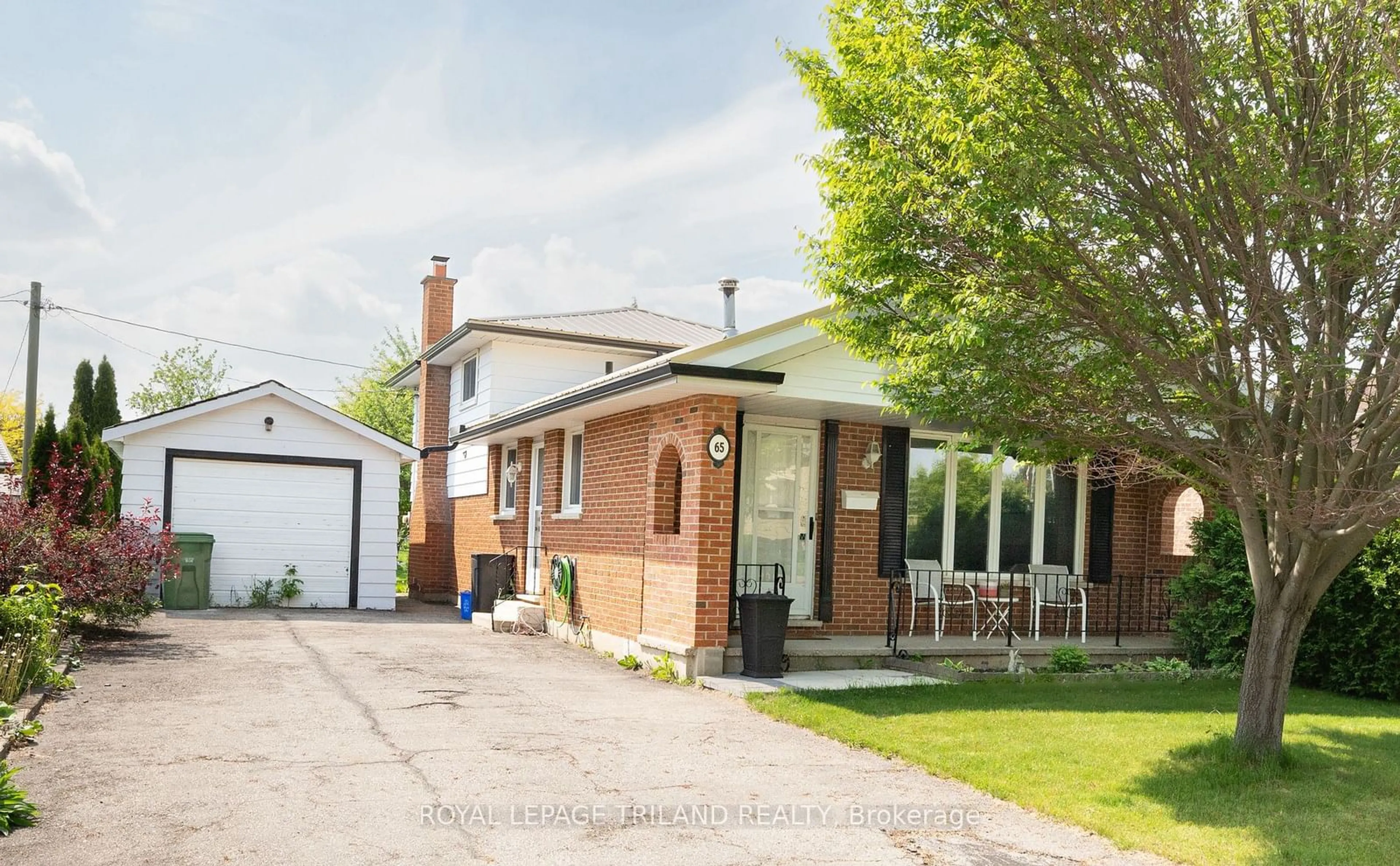 Home with brick exterior material, street for 65 Manor Rd, St. Thomas Ontario N5R 5R3