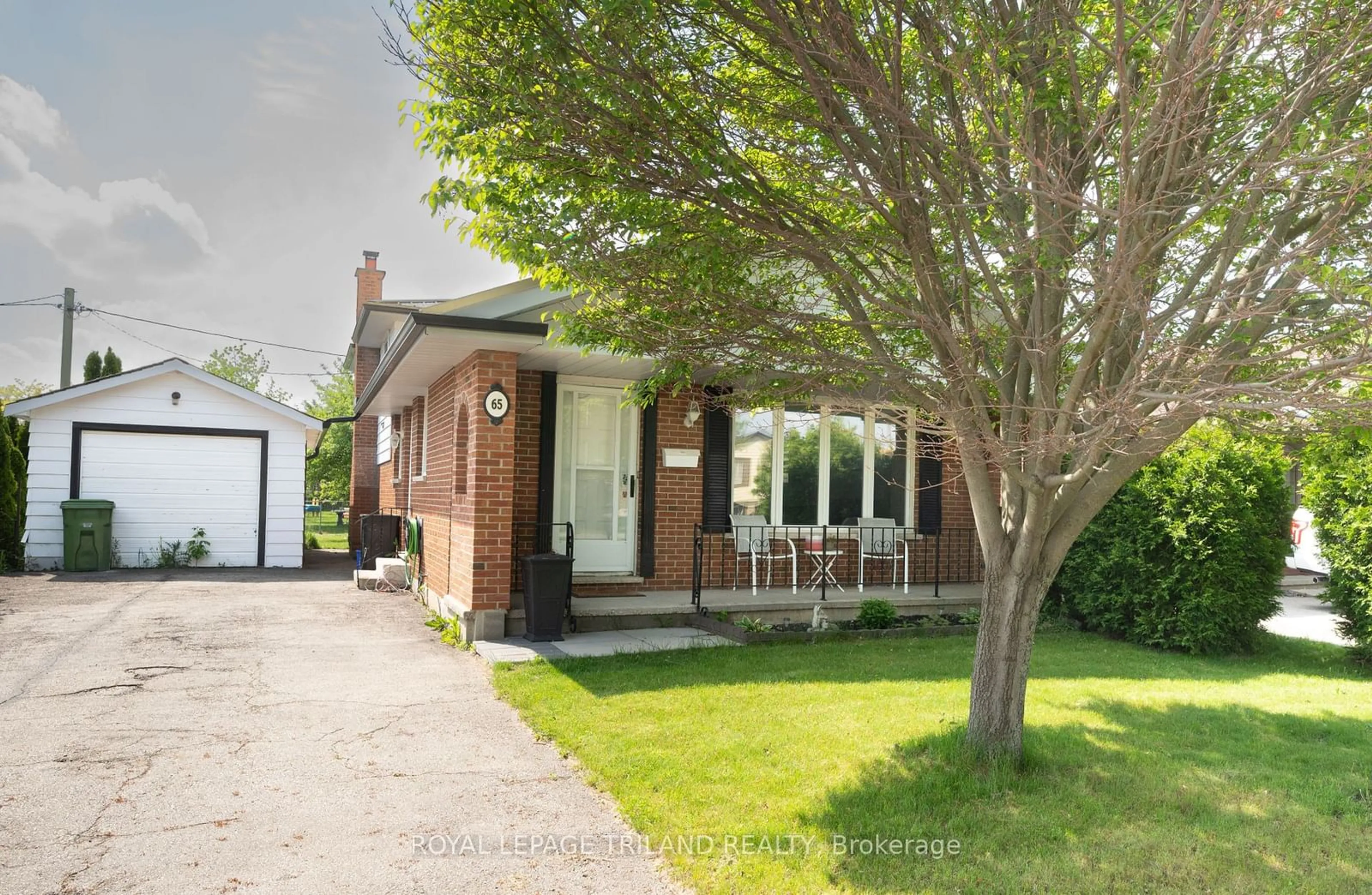 Home with brick exterior material, street for 65 Manor Rd, St. Thomas Ontario N5R 5R3