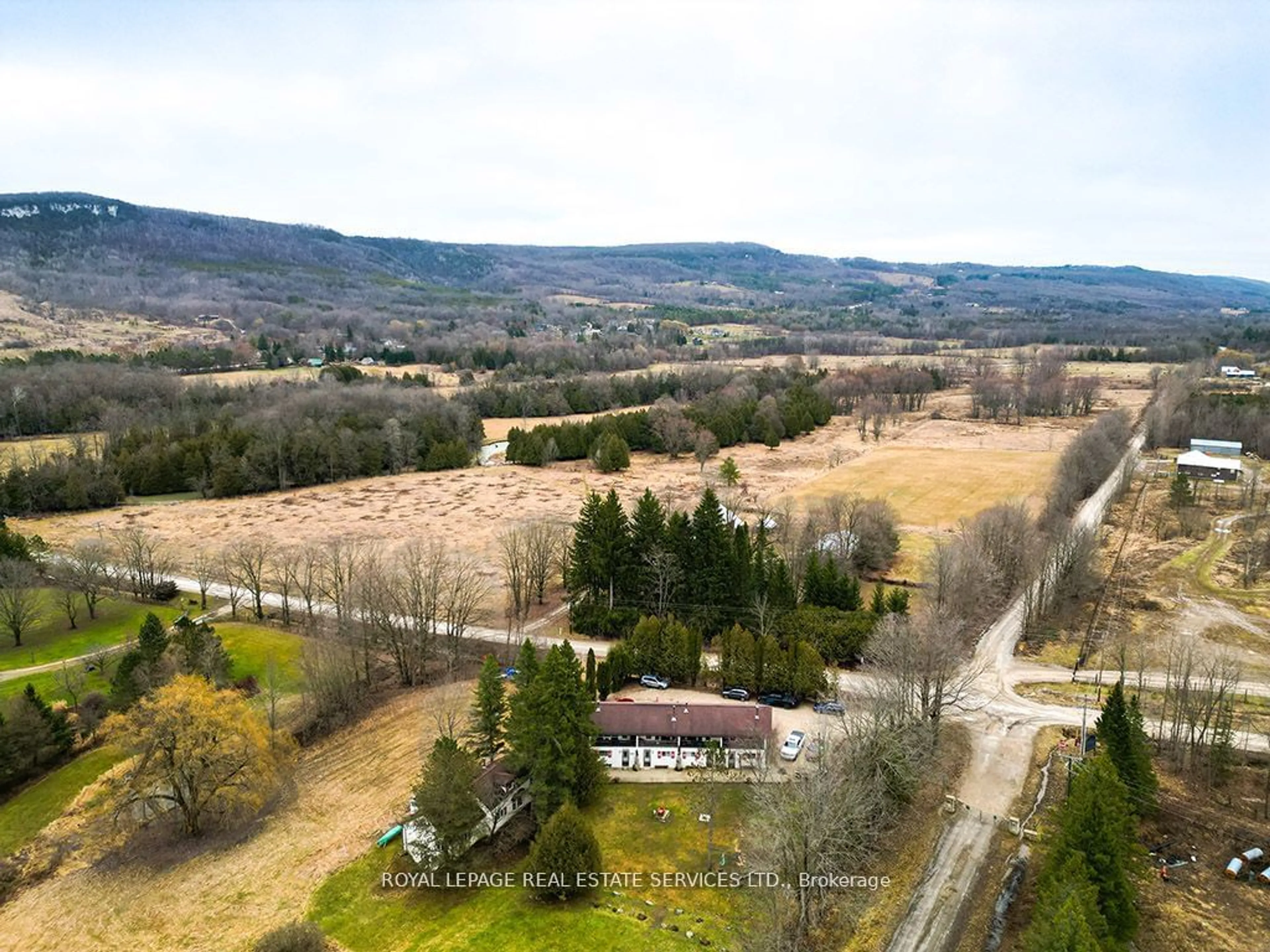 A pic from outside/outdoor area/front of a property/back of a property/a pic from drone, mountain view for 566237 Sideroad 7A #3, Grey Highlands Ontario N0C 1G0