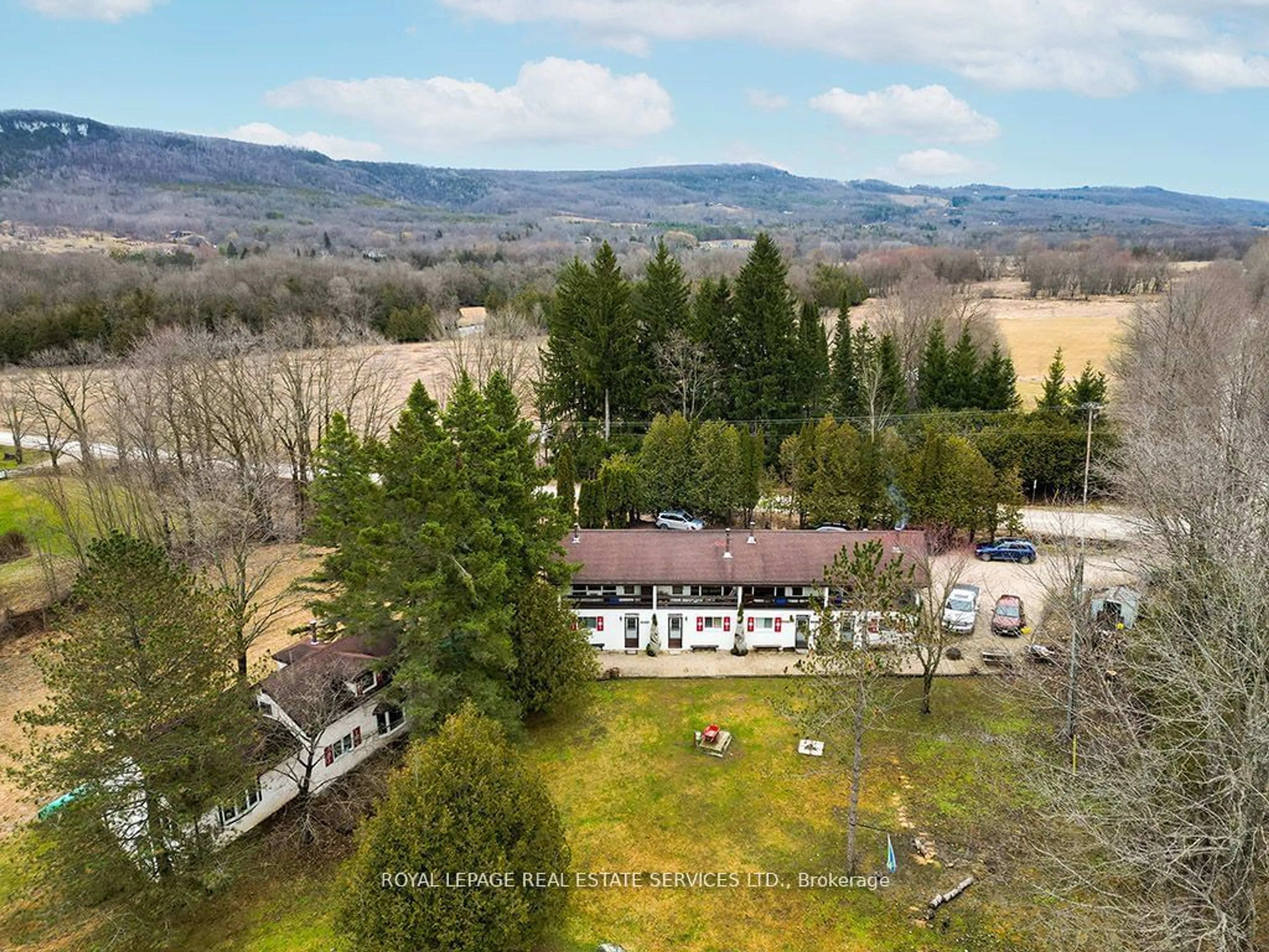 A pic from outside/outdoor area/front of a property/back of a property/a pic from drone, mountain view for 566237 Sideroad 7A #3, Grey Highlands Ontario N0C 1G0