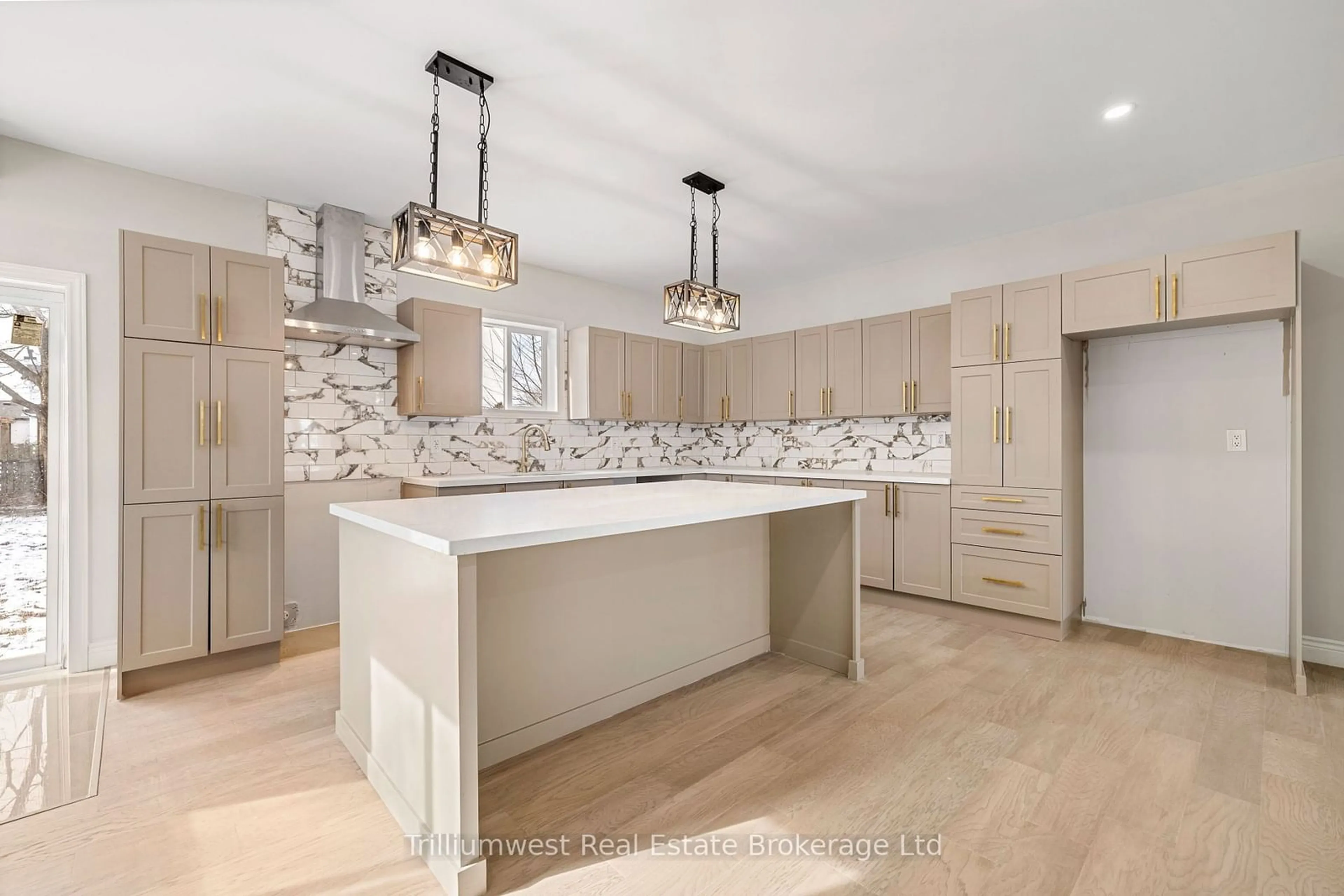 Open concept kitchen, ceramic/tile floor for 128 Ducharme St, Lakeshore Ontario N0R 1A0