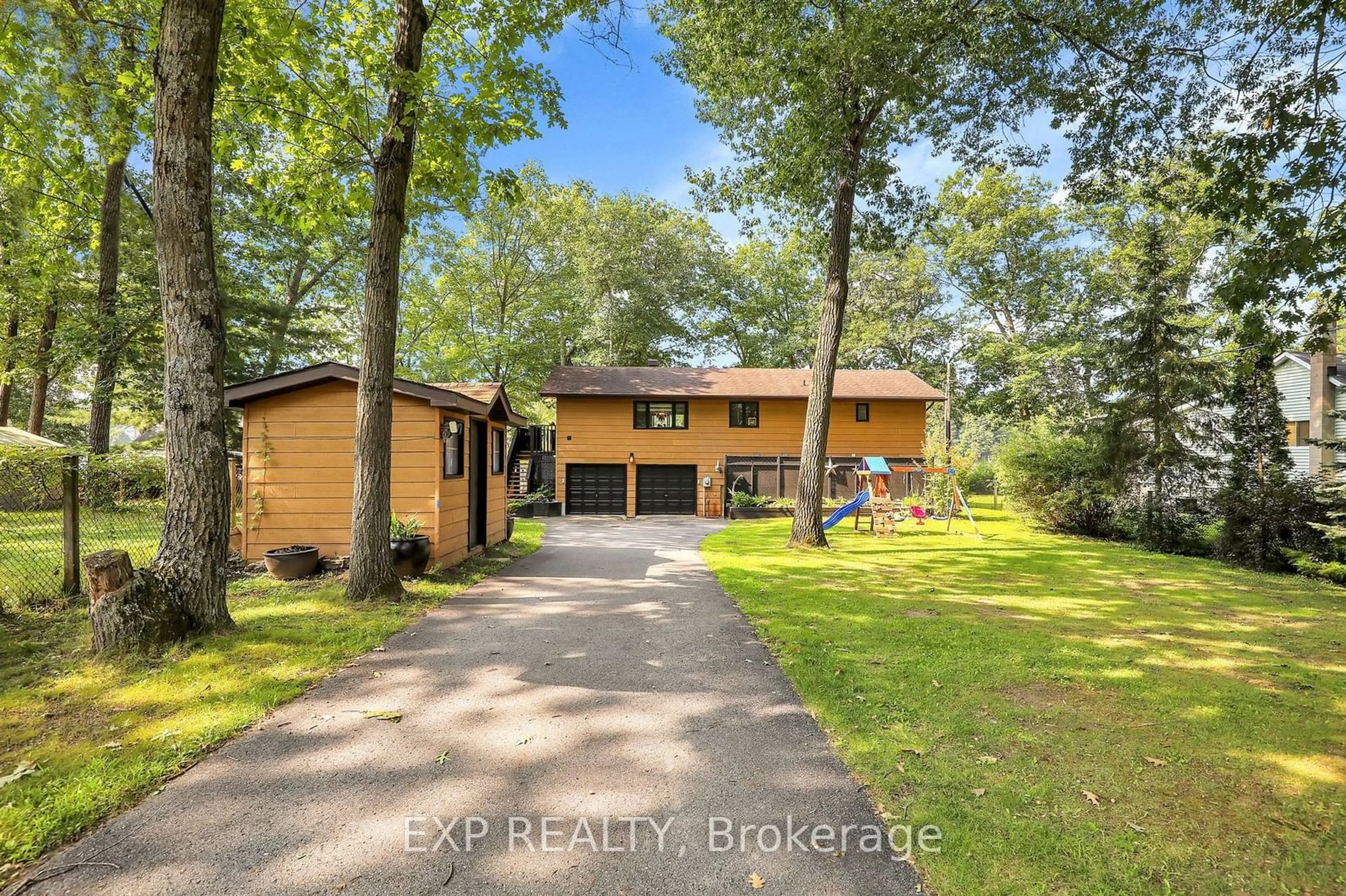 A pic from outside/outdoor area/front of a property/back of a property/a pic from drone, water/lake/river/ocean view for 1034 Bayview Dr, Ottawa Ontario K0A 3M0