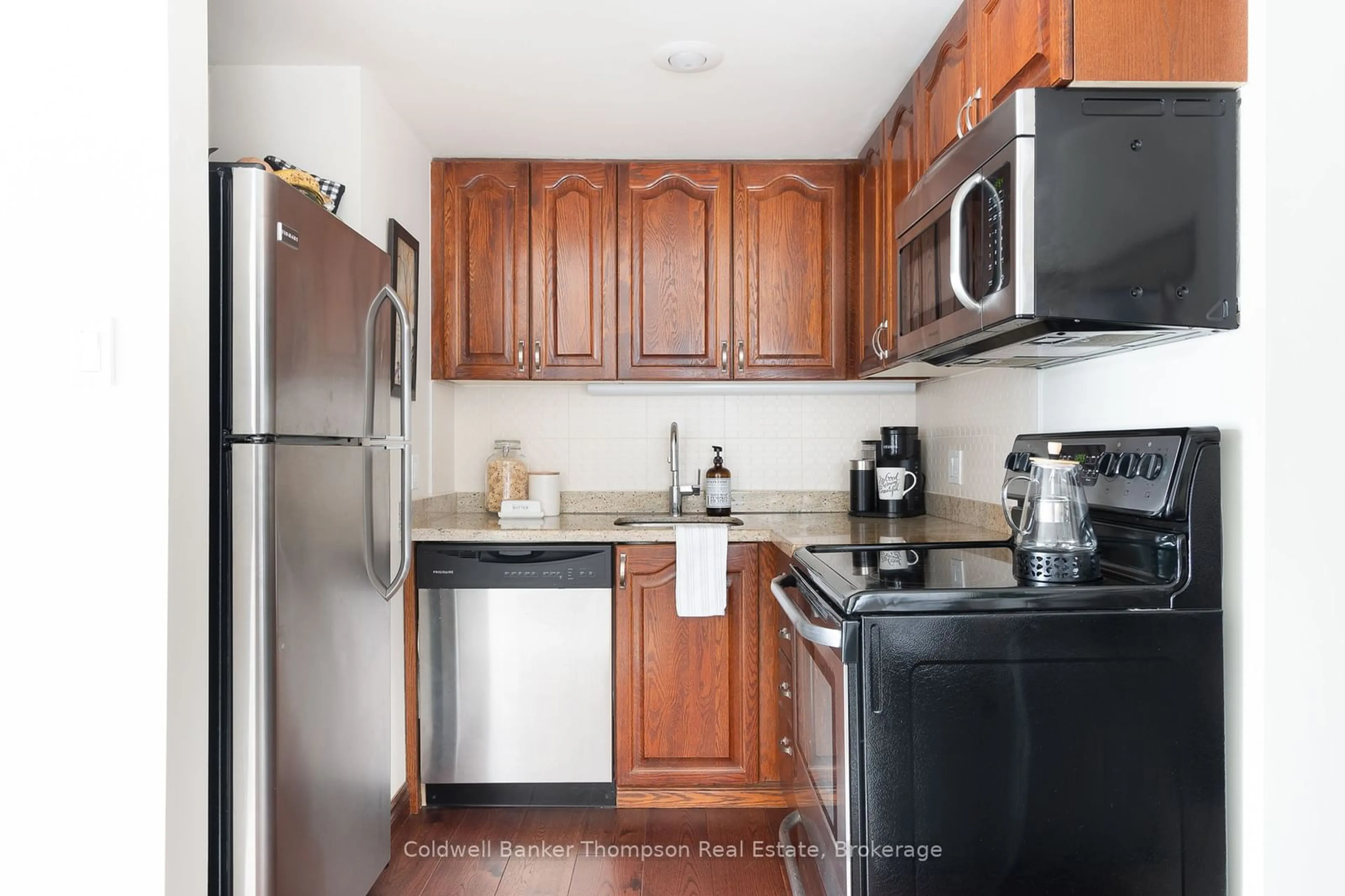 Standard kitchen, ceramic/tile floor for 34 Deerhurst Greens Rd #301, Huntsville Ontario P1H 1A9