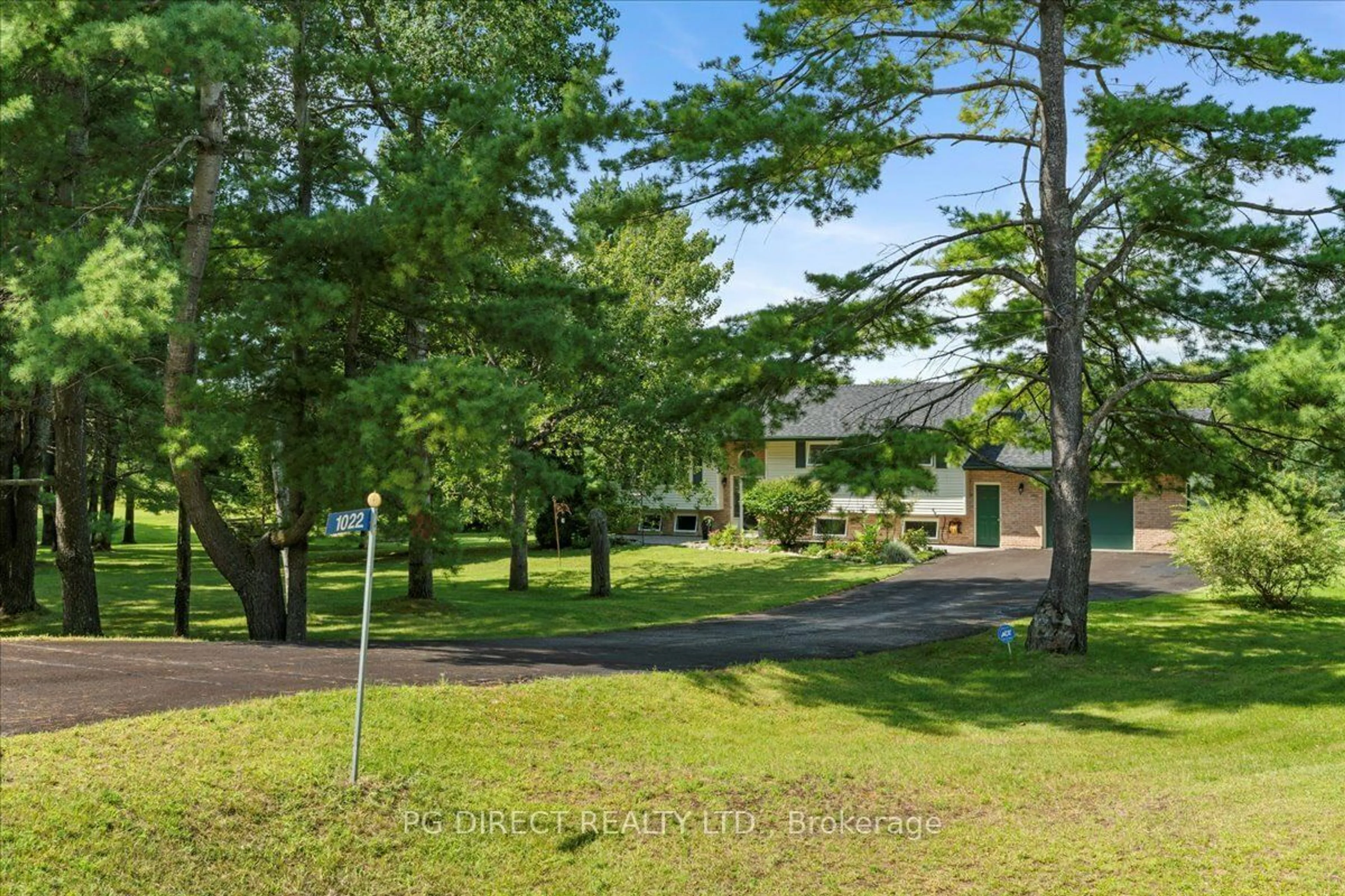 A pic from outside/outdoor area/front of a property/back of a property/a pic from drone, forest/trees view for 1022 County Rd 5, Quinte West Ontario K0K 2C0