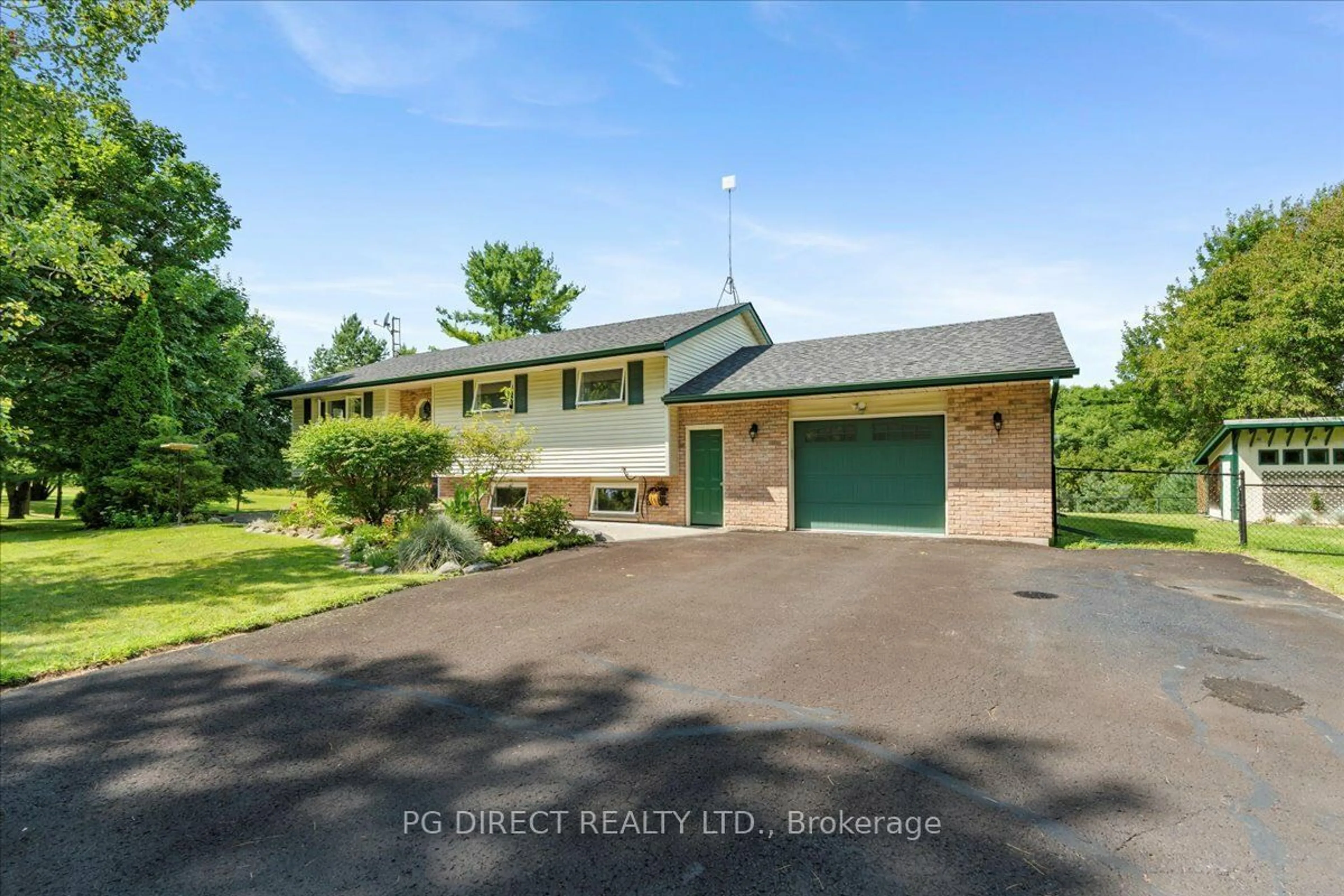 A pic from outside/outdoor area/front of a property/back of a property/a pic from drone, street for 1022 County Rd 5, Quinte West Ontario K0K 2C0