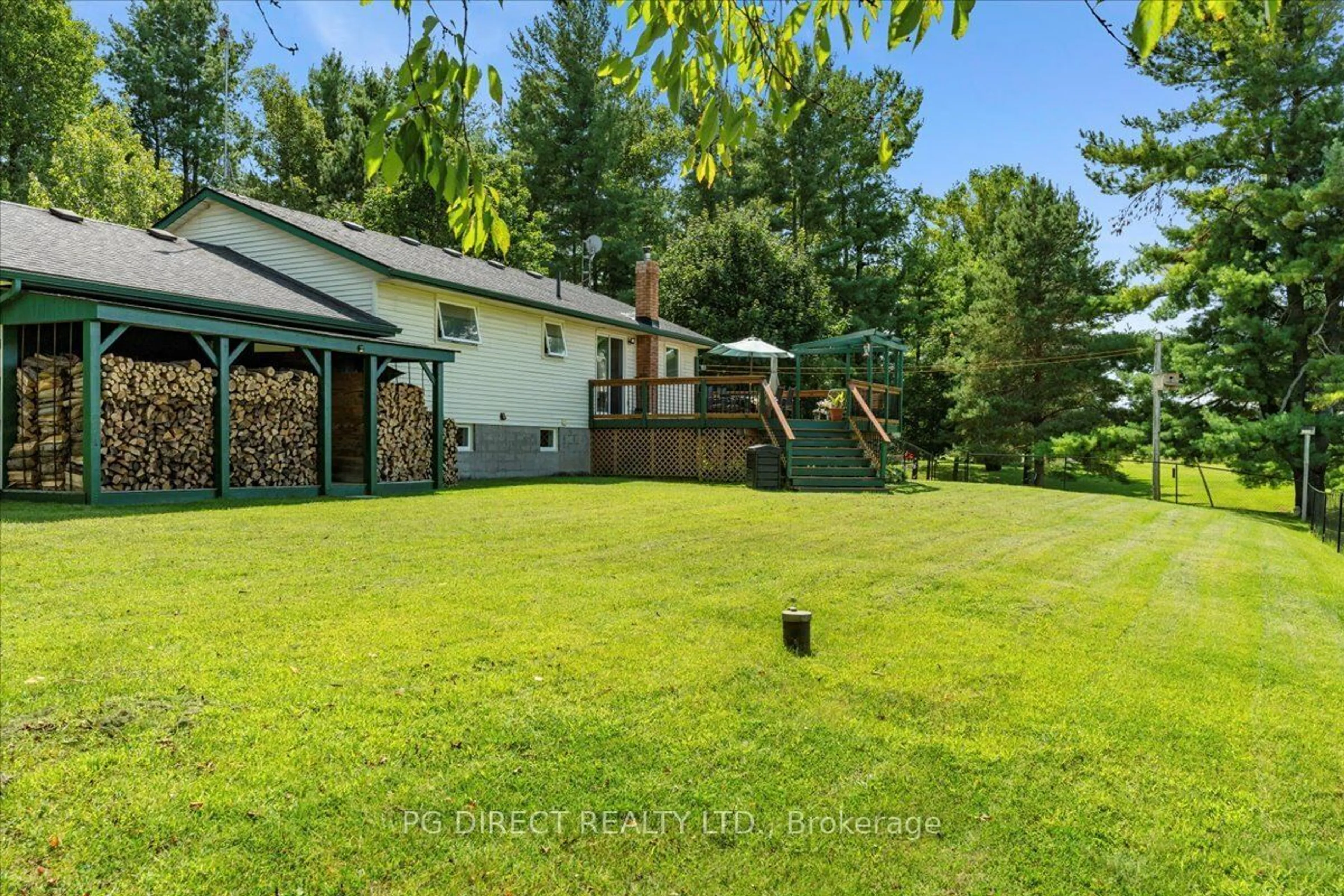 A pic from outside/outdoor area/front of a property/back of a property/a pic from drone, water/lake/river/ocean view for 1022 County Rd 5, Quinte West Ontario K0K 2C0