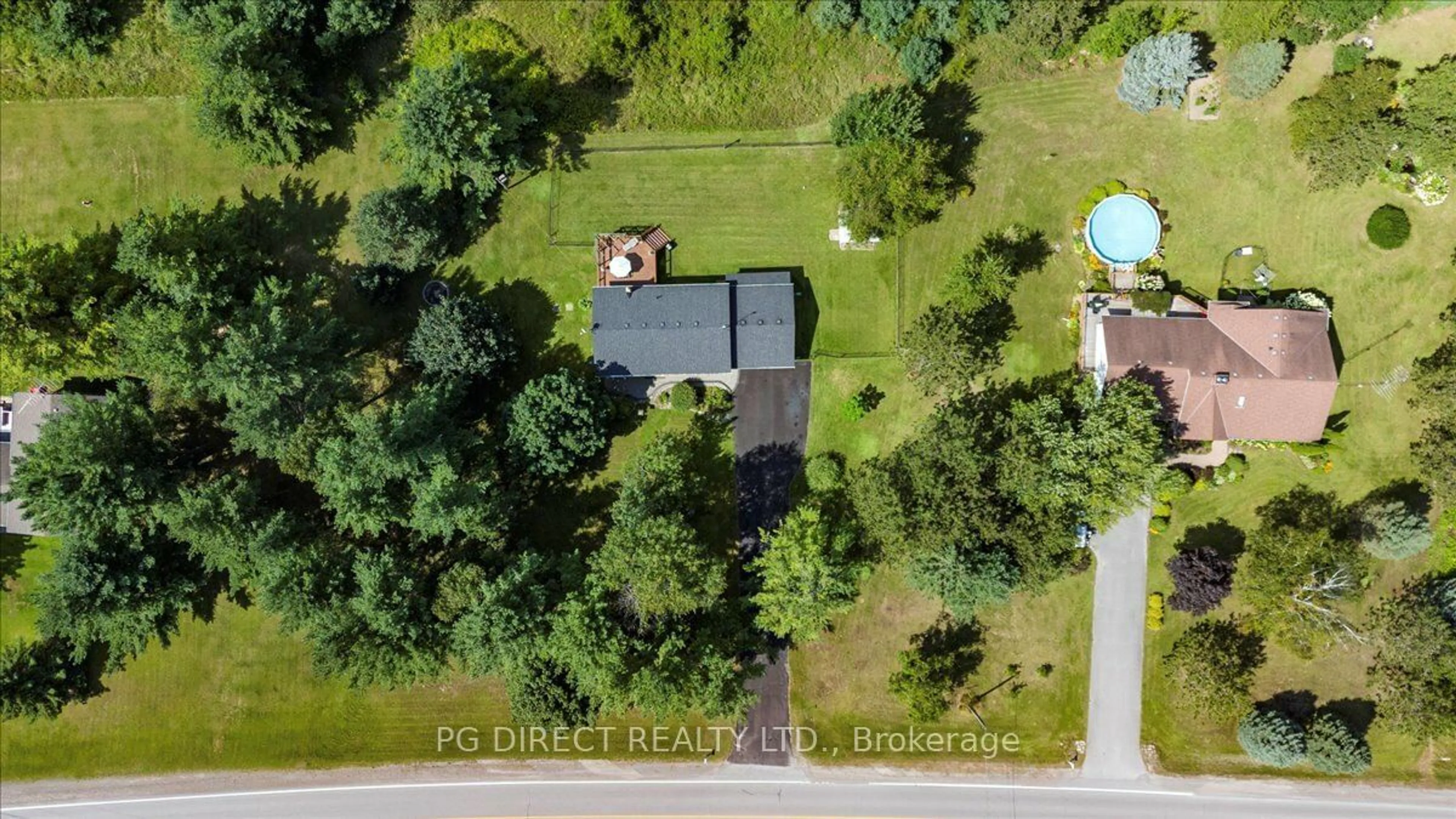 A pic from outside/outdoor area/front of a property/back of a property/a pic from drone, street for 1022 County Rd 5, Quinte West Ontario K0K 2C0