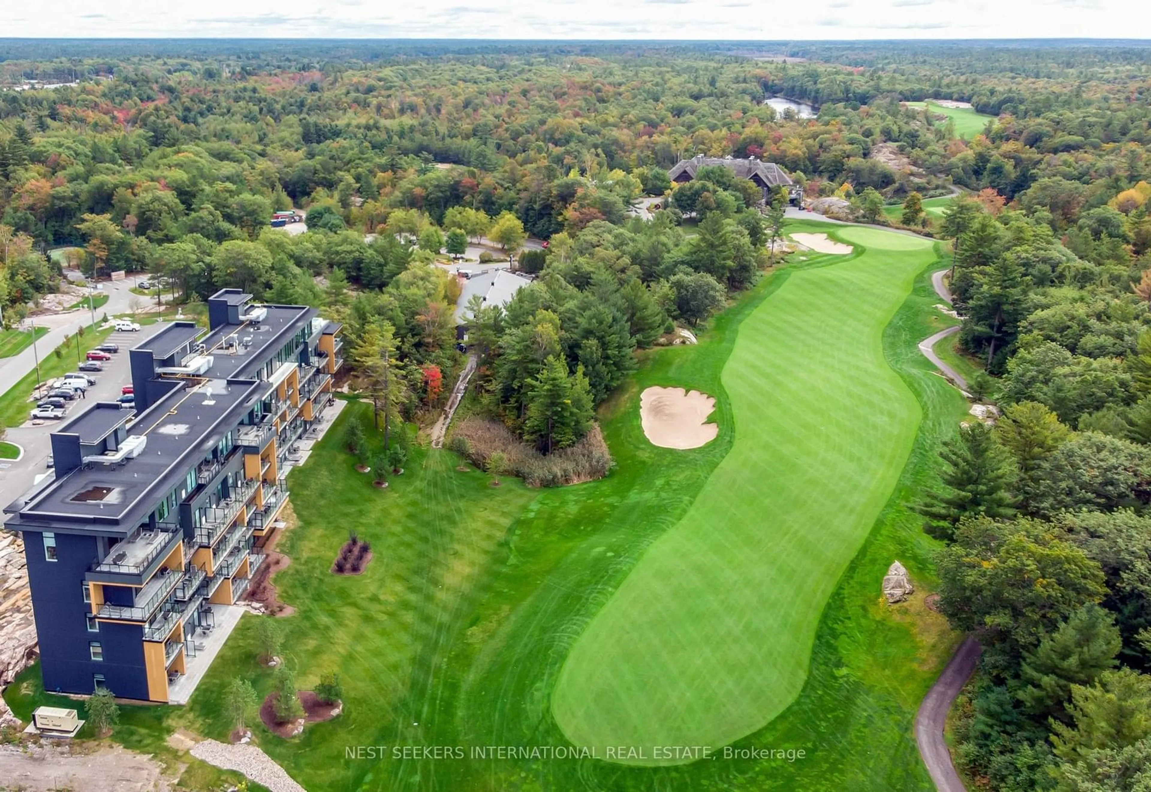 A pic from outside/outdoor area/front of a property/back of a property/a pic from drone, unknown for 120 Carrick Tr #411, Gravenhurst Ontario P1P 0B6