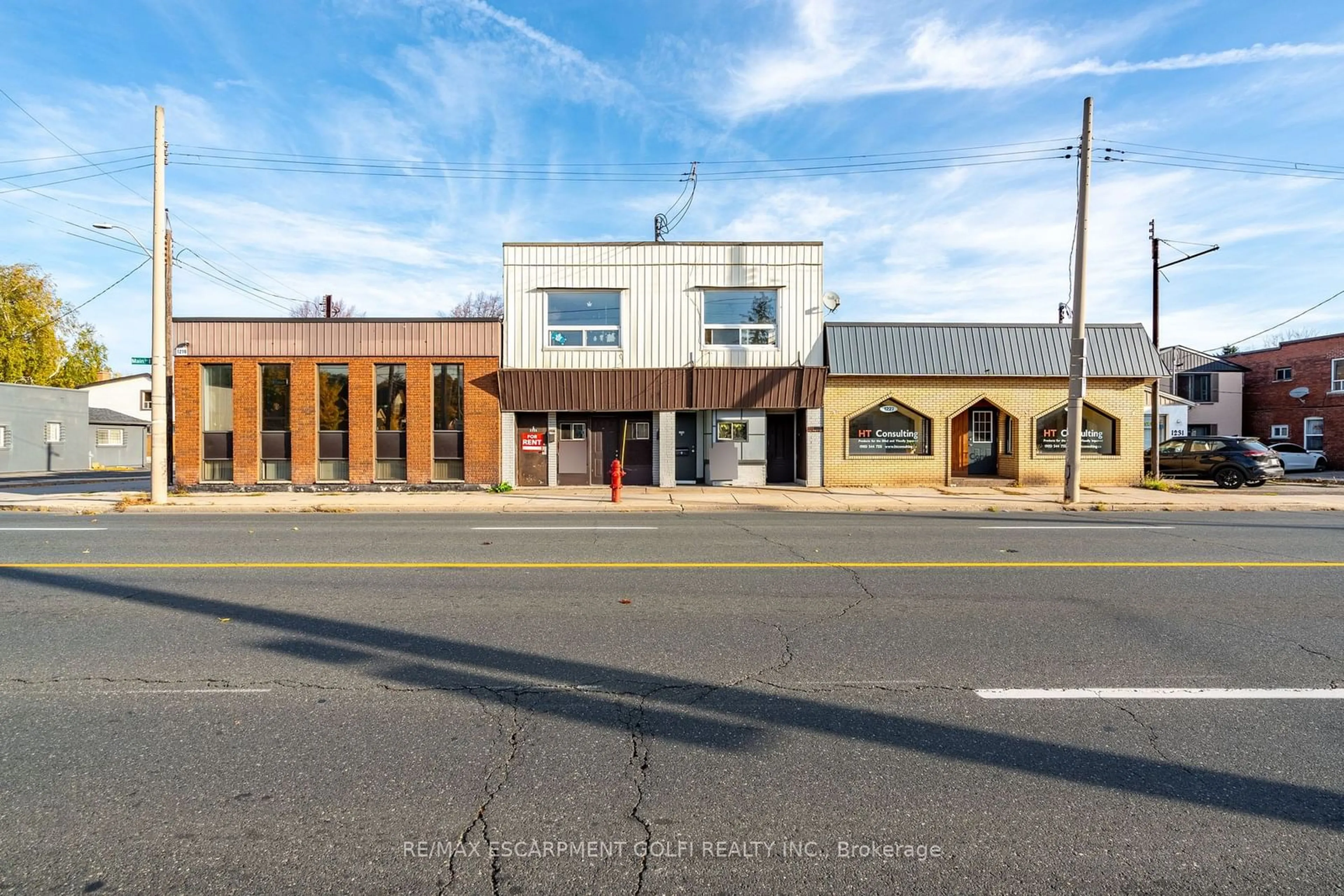 A pic from outside/outdoor area/front of a property/back of a property/a pic from drone, building for 1221 - 1223 MAIN St, Hamilton Ontario L8K 1A5