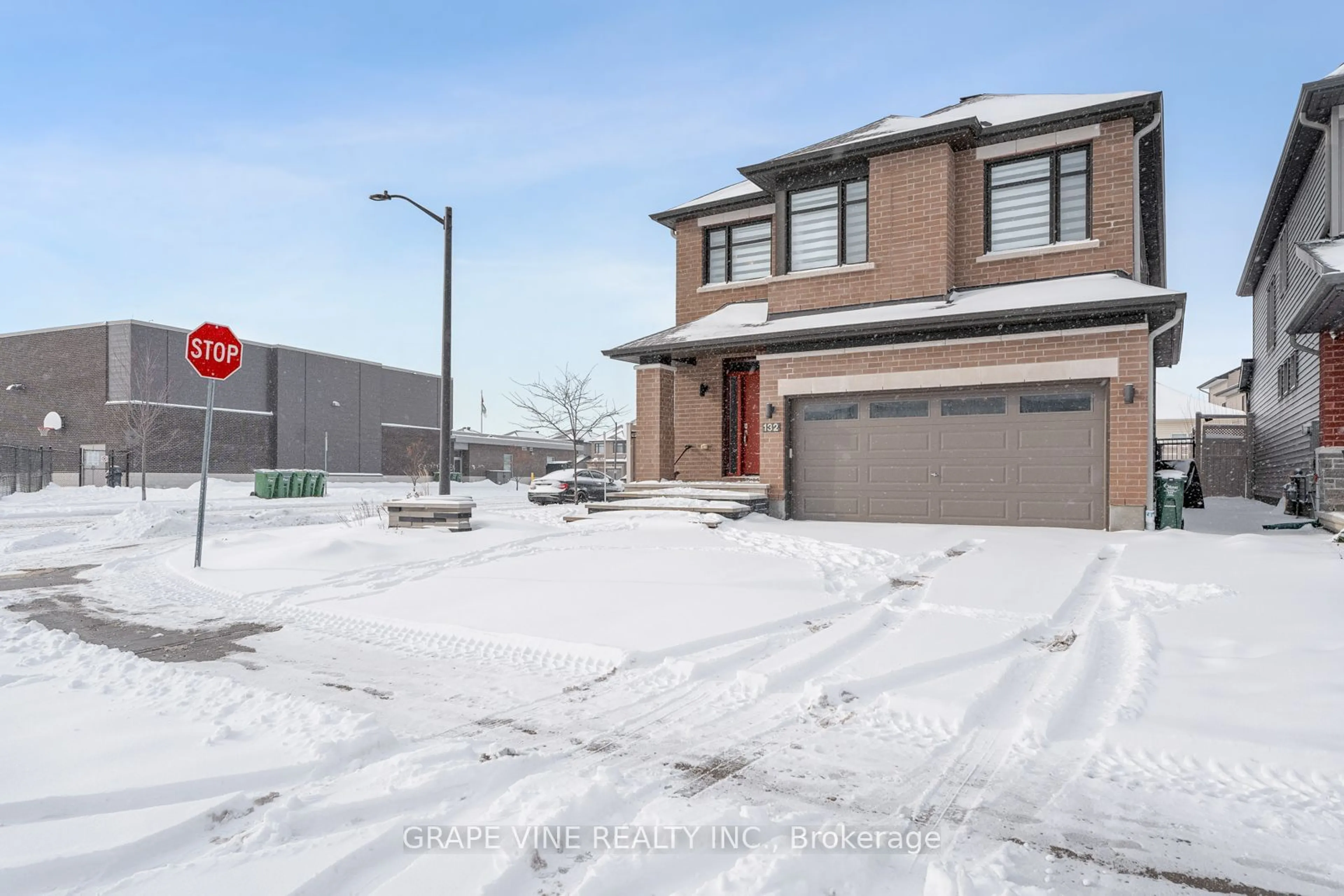 Home with brick exterior material, street for 132 Pathfinder Way, Ottawa Ontario K1X 0C9