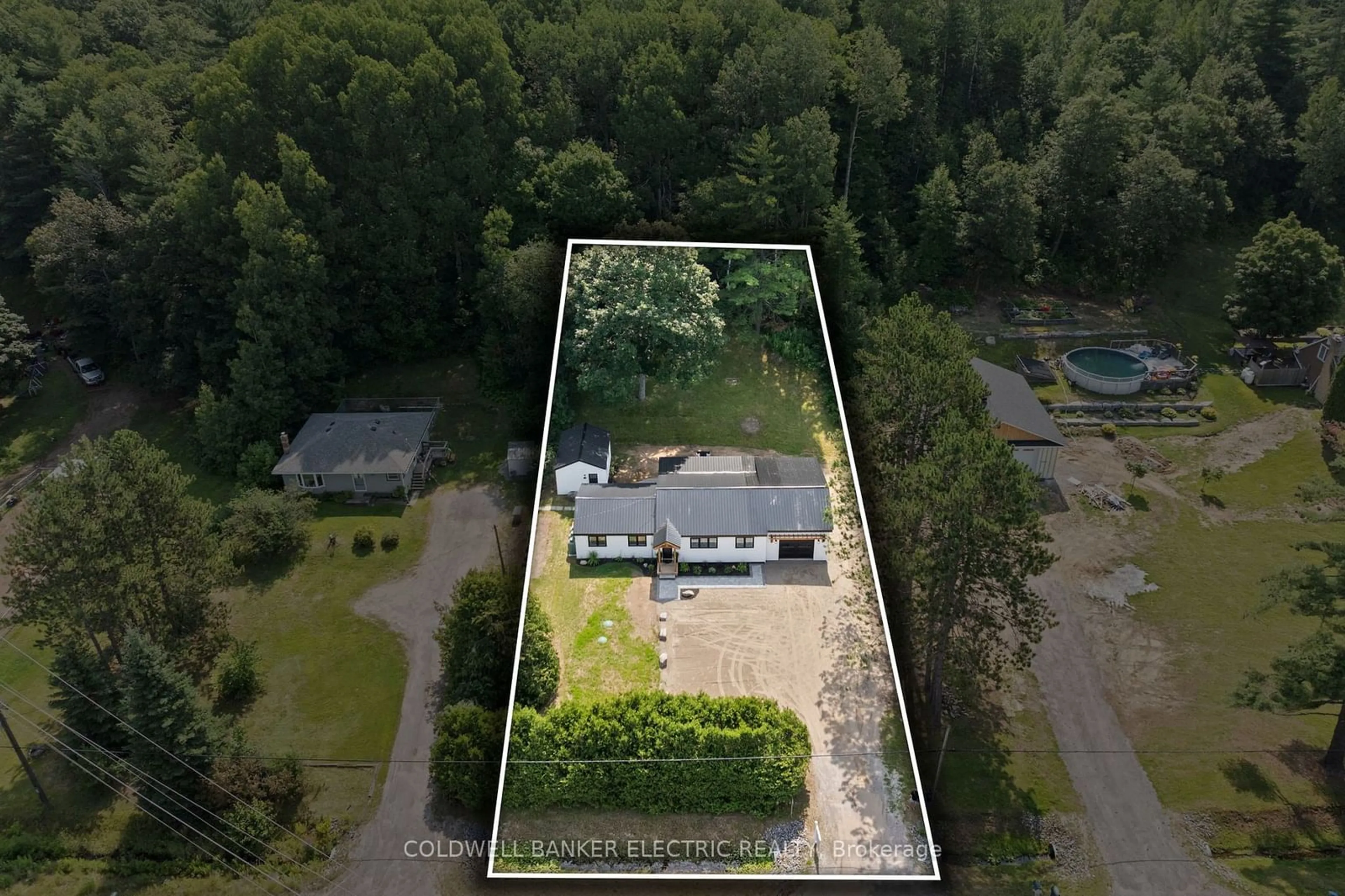 A pic from outside/outdoor area/front of a property/back of a property/a pic from drone, unknown for 29580 Highway 62, Hastings Highlands Ontario K0L 1C0