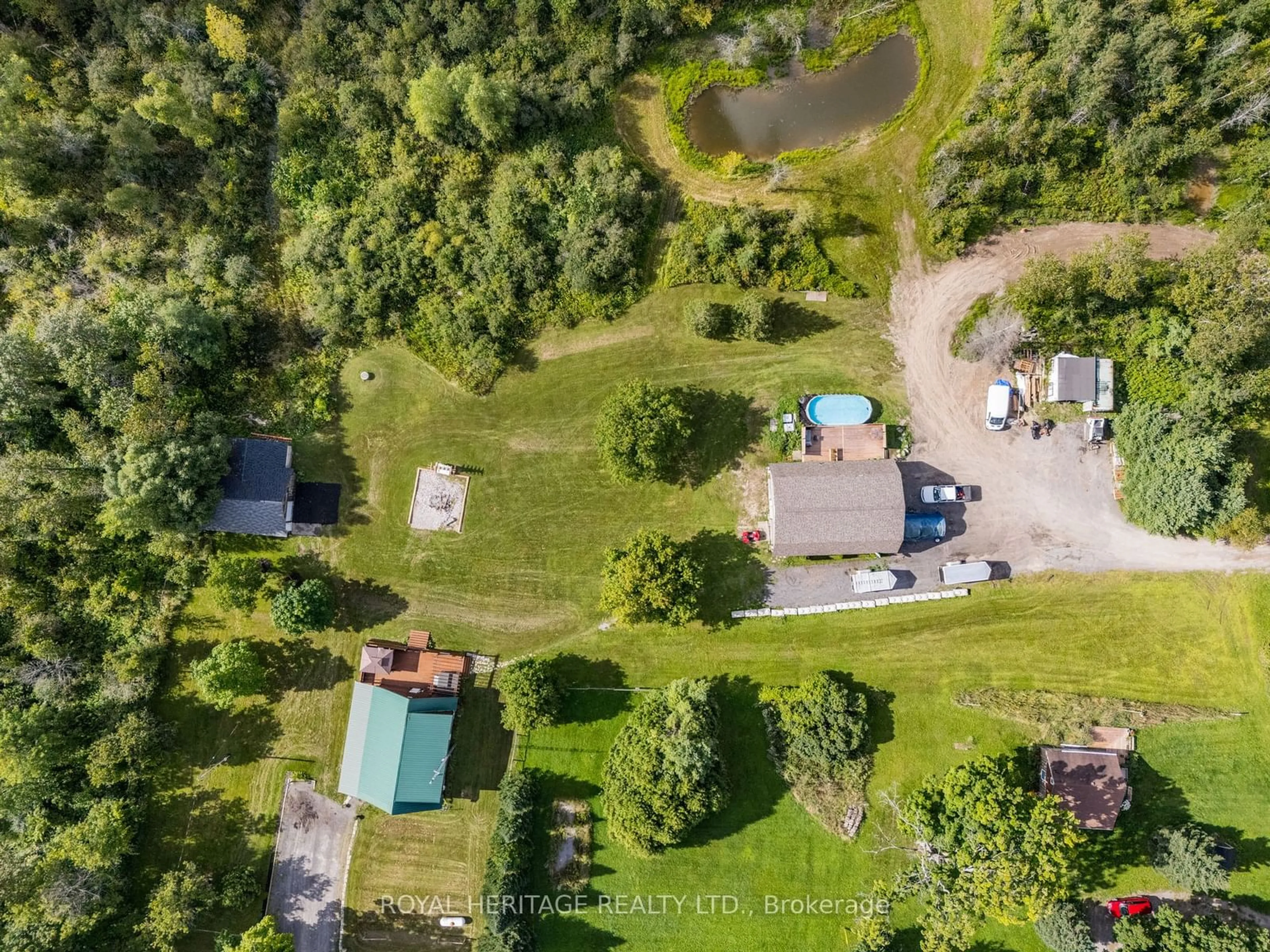 A pic from outside/outdoor area/front of a property/back of a property/a pic from drone, forest/trees view for 552 Mitchell Rd, Cramahe Ontario K0K 3K0