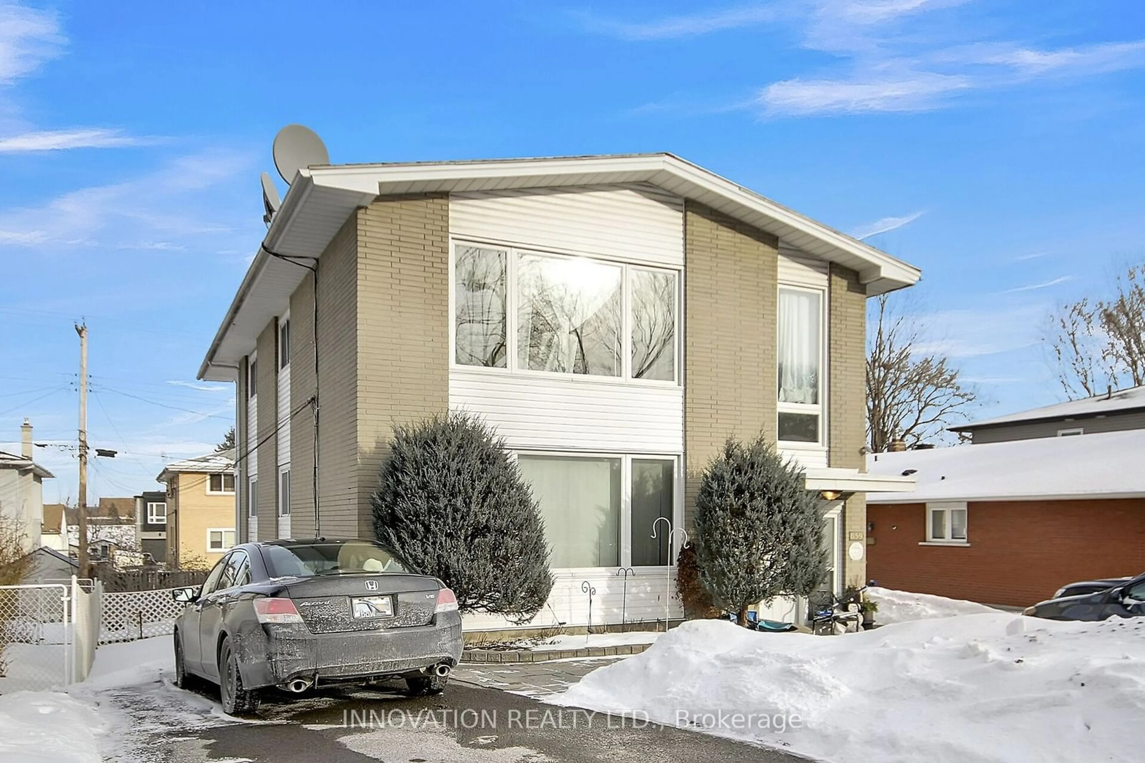 Home with brick exterior material, street for 859 Tavistock Rd, Britannia Heights - Queensway Terrace N and Area Ontario K2B 5N5