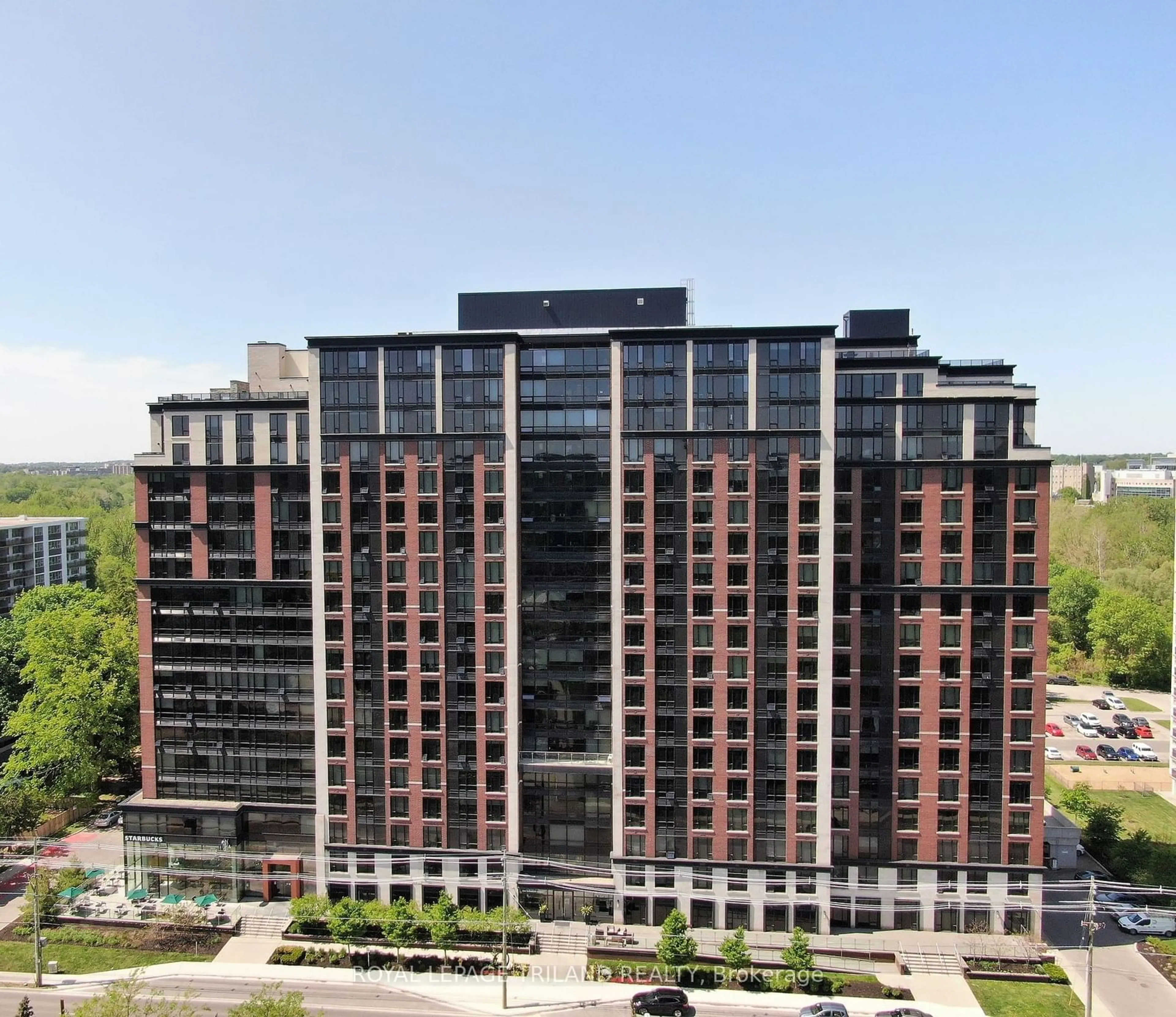 A pic from outside/outdoor area/front of a property/back of a property/a pic from drone, city buildings view from balcony for 1235 Richmond St #303, London Ontario N6A 3L5