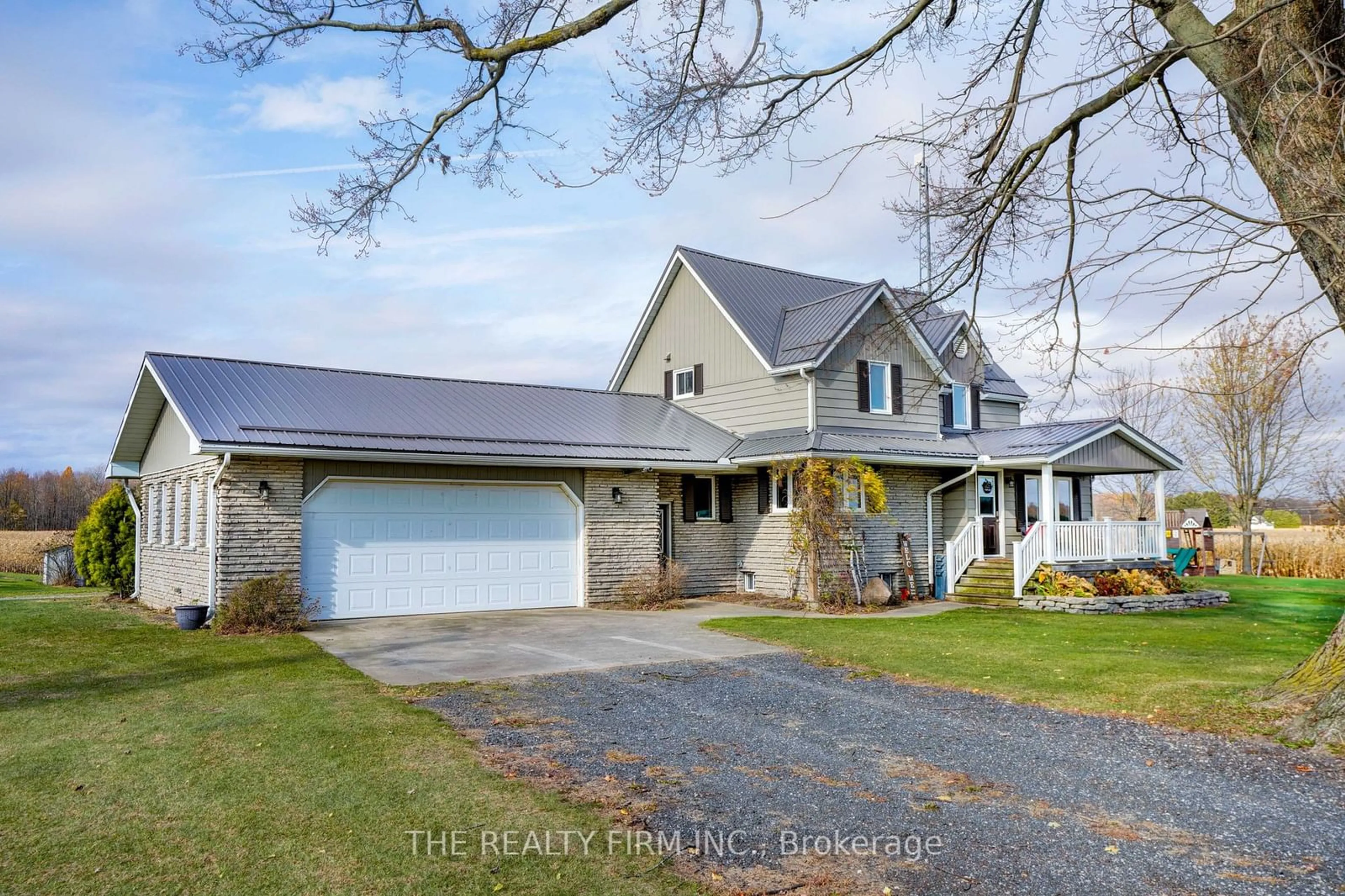 A pic from outside/outdoor area/front of a property/back of a property/a pic from drone, street for 20662 Marsh Line, West Elgin Ontario N0L 2C0