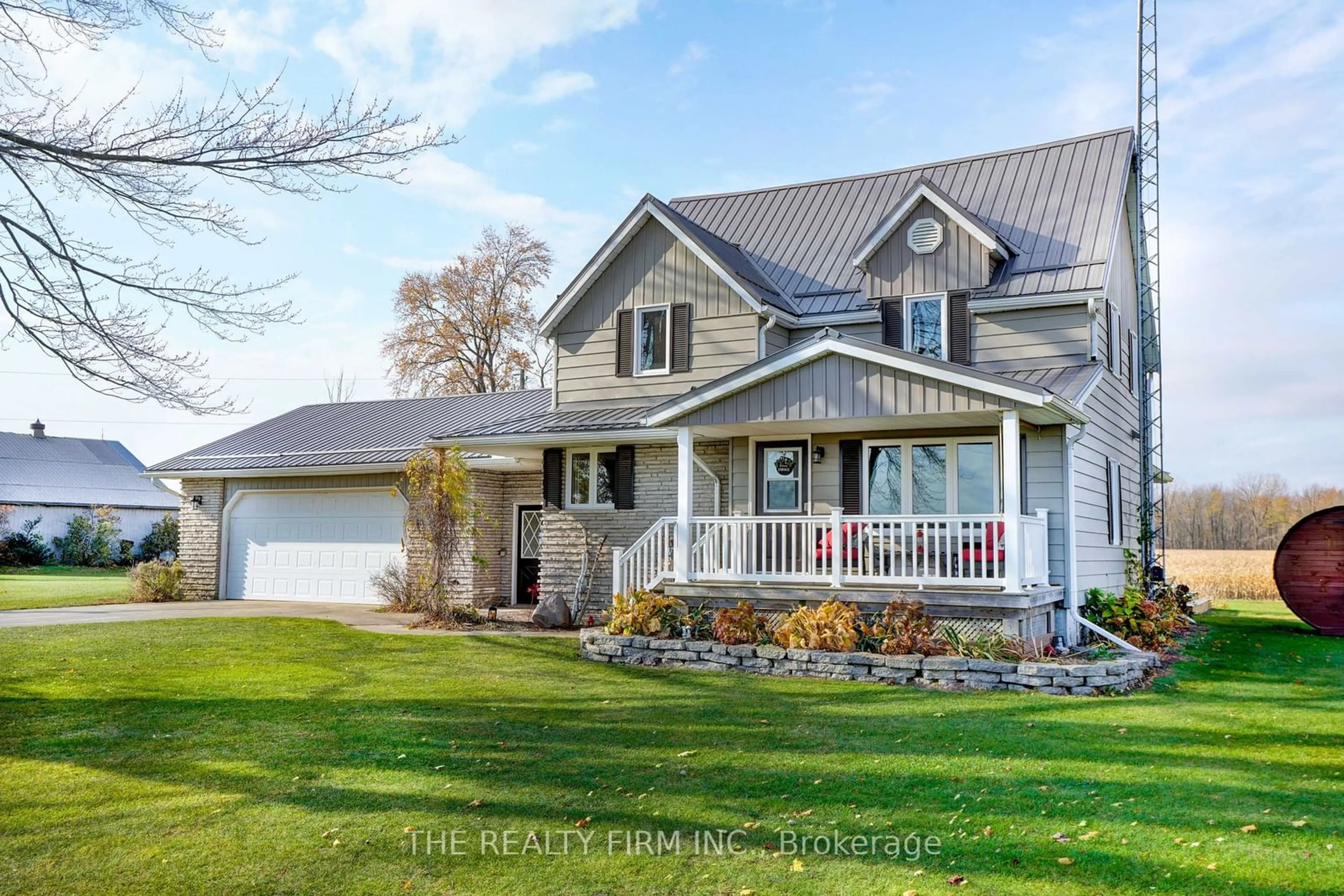 Home with vinyl exterior material, street for 20662 Marsh Line, West Elgin Ontario N0L 2C0