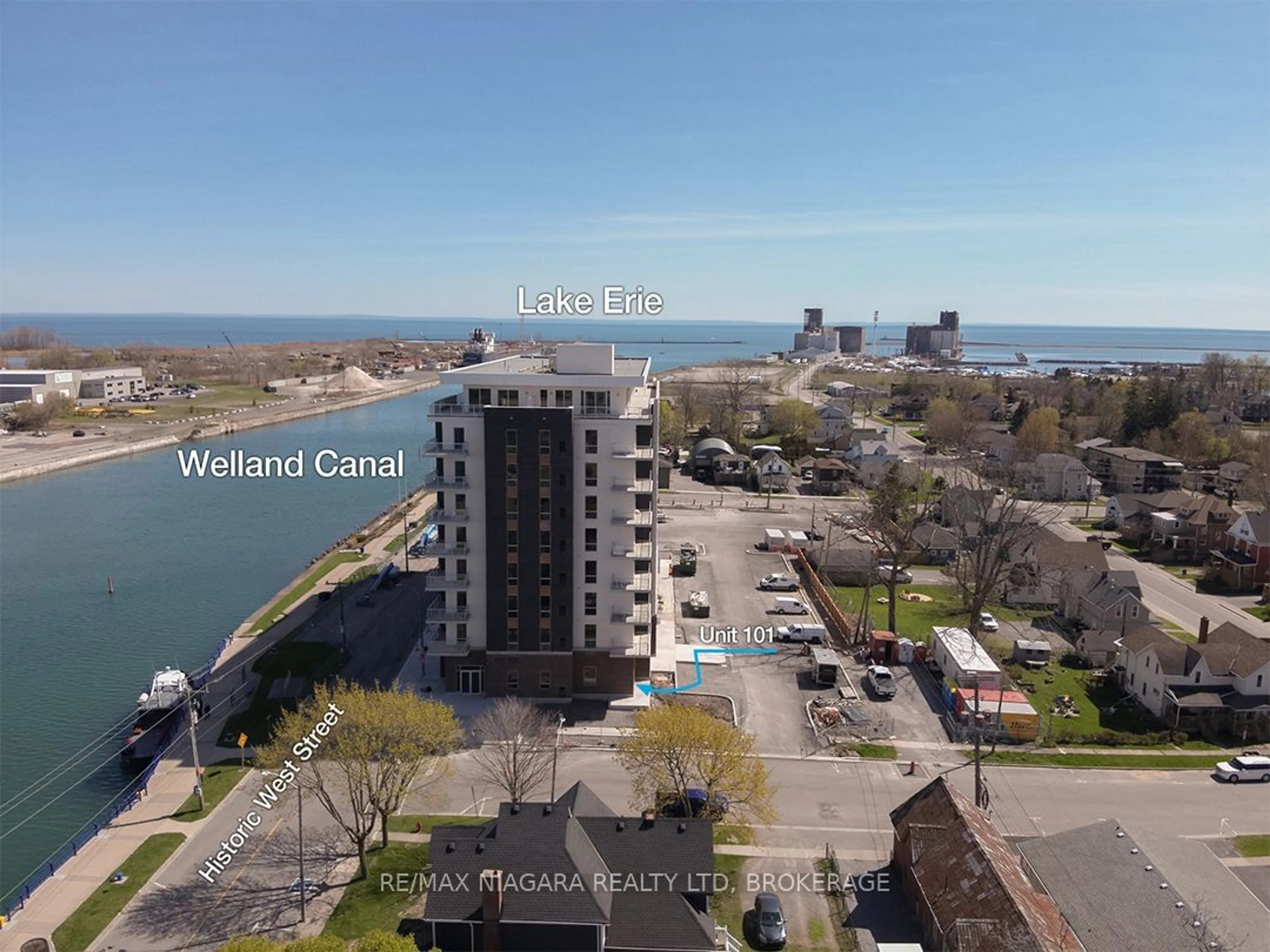 A pic from outside/outdoor area/front of a property/back of a property/a pic from drone, water/lake/river/ocean view for 118 WEST St #101, Port Colborne Ontario L3K 0B9