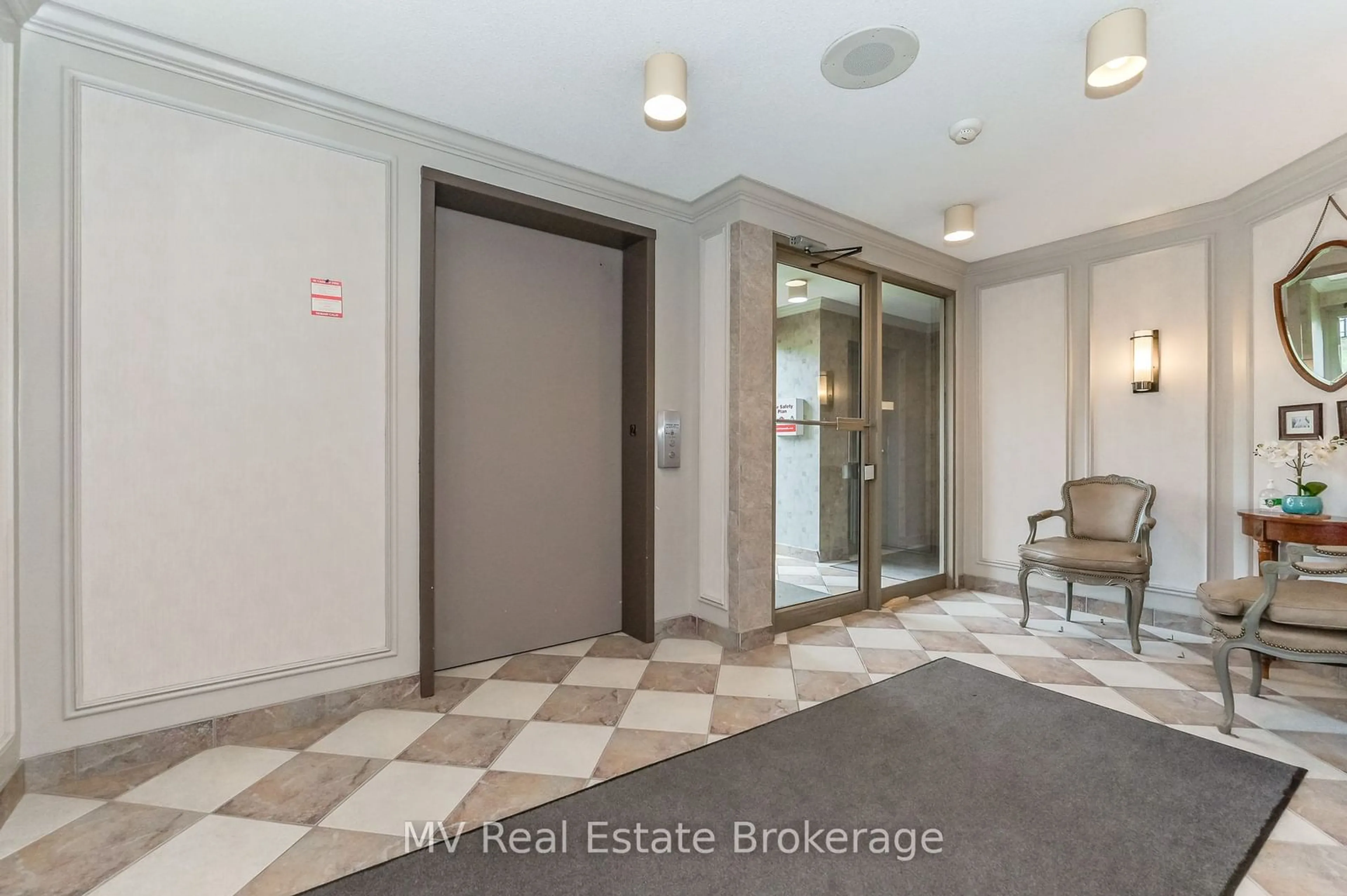 Indoor foyer for 245 QUEEN St #102, Centre Wellington Ontario N1M 3R6