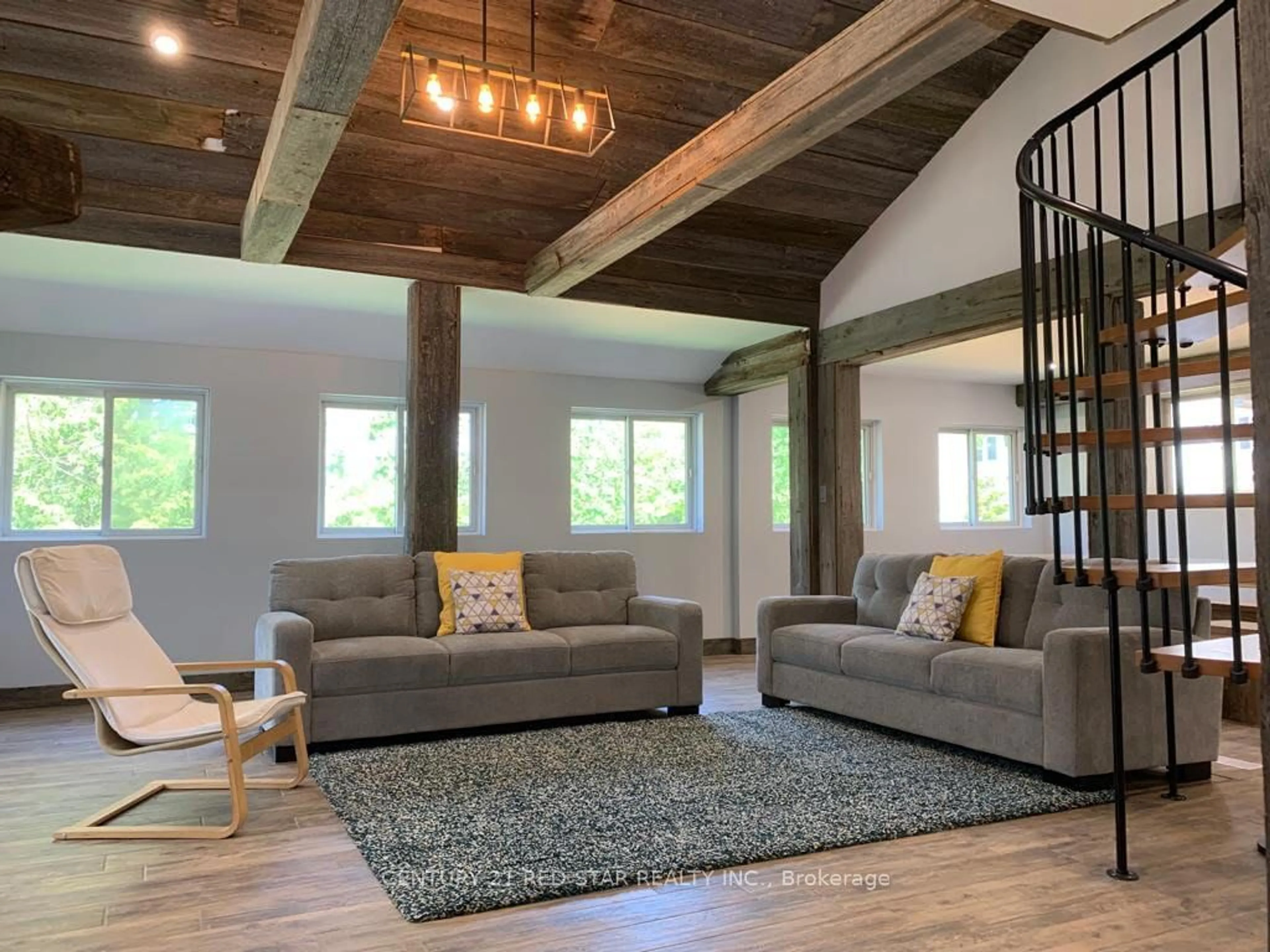 Living room with furniture, wood/laminate floor for 112 NORDIC Rd, Blue Mountains Ontario N0H 2E0