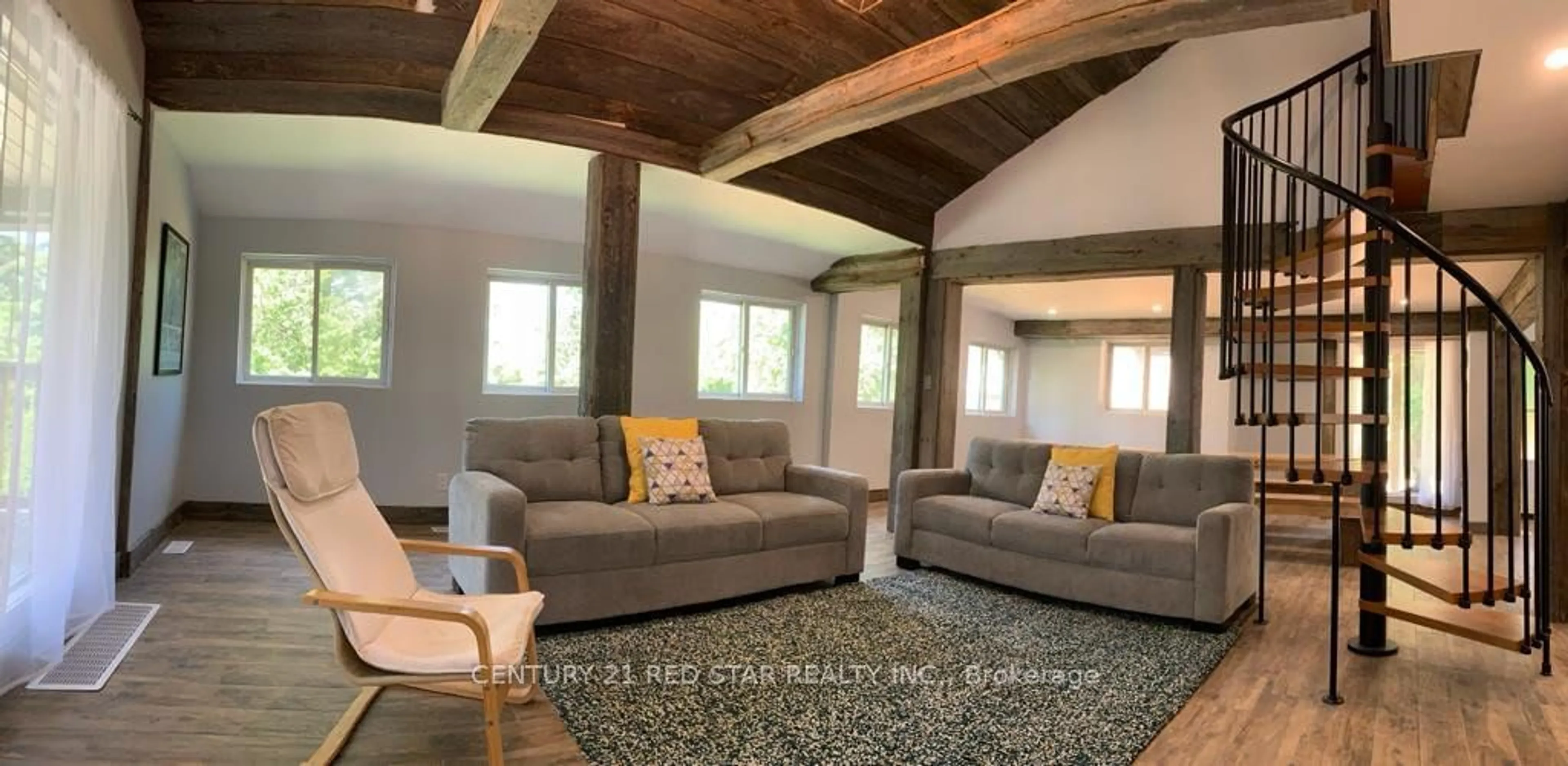 Living room with furniture, wood/laminate floor for 112 NORDIC Rd, Blue Mountains Ontario N0H 2E0