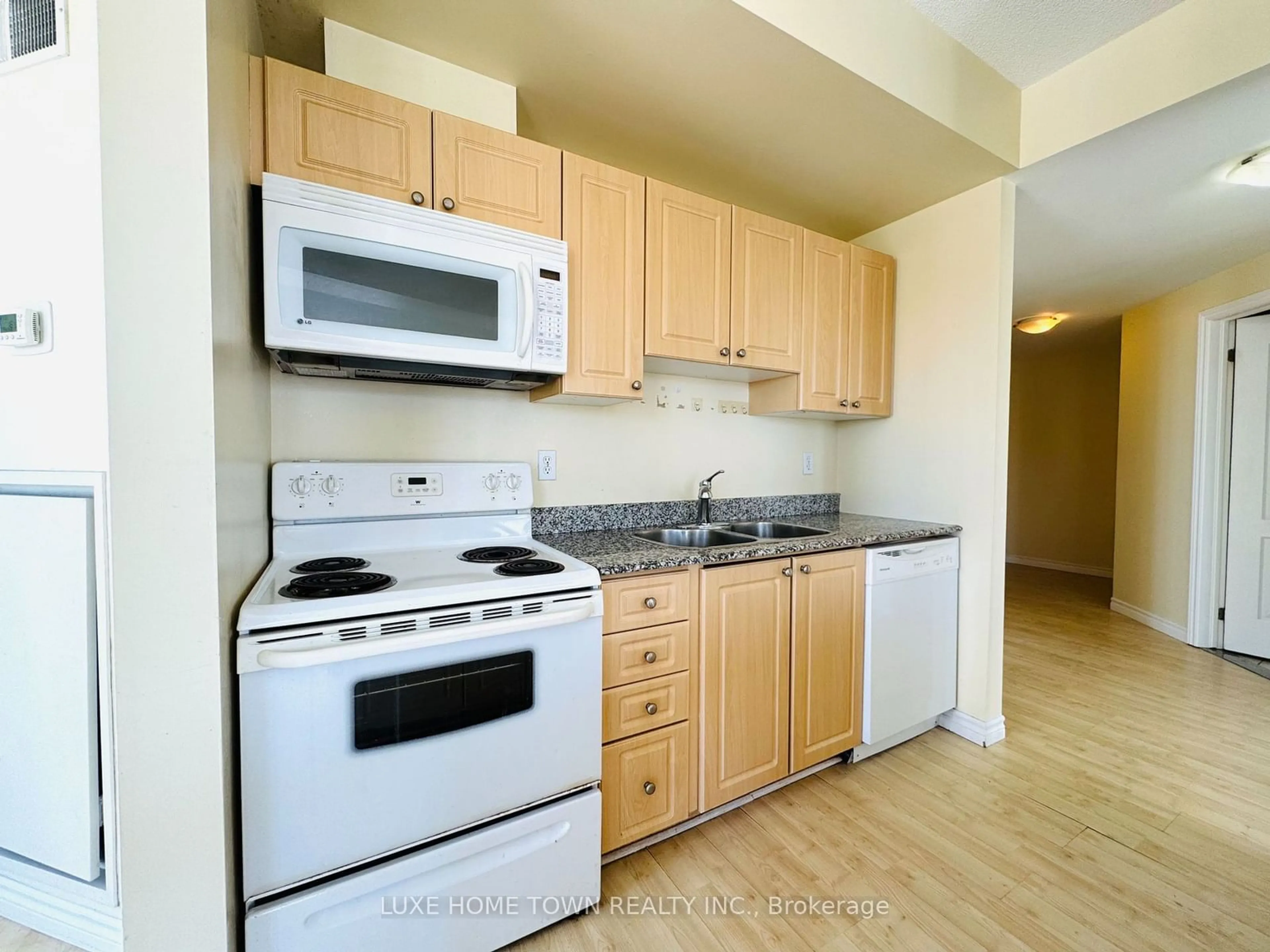 Standard kitchen, wood/laminate floor for 135 James St #1401, Hamilton Ontario L8P 2Z6