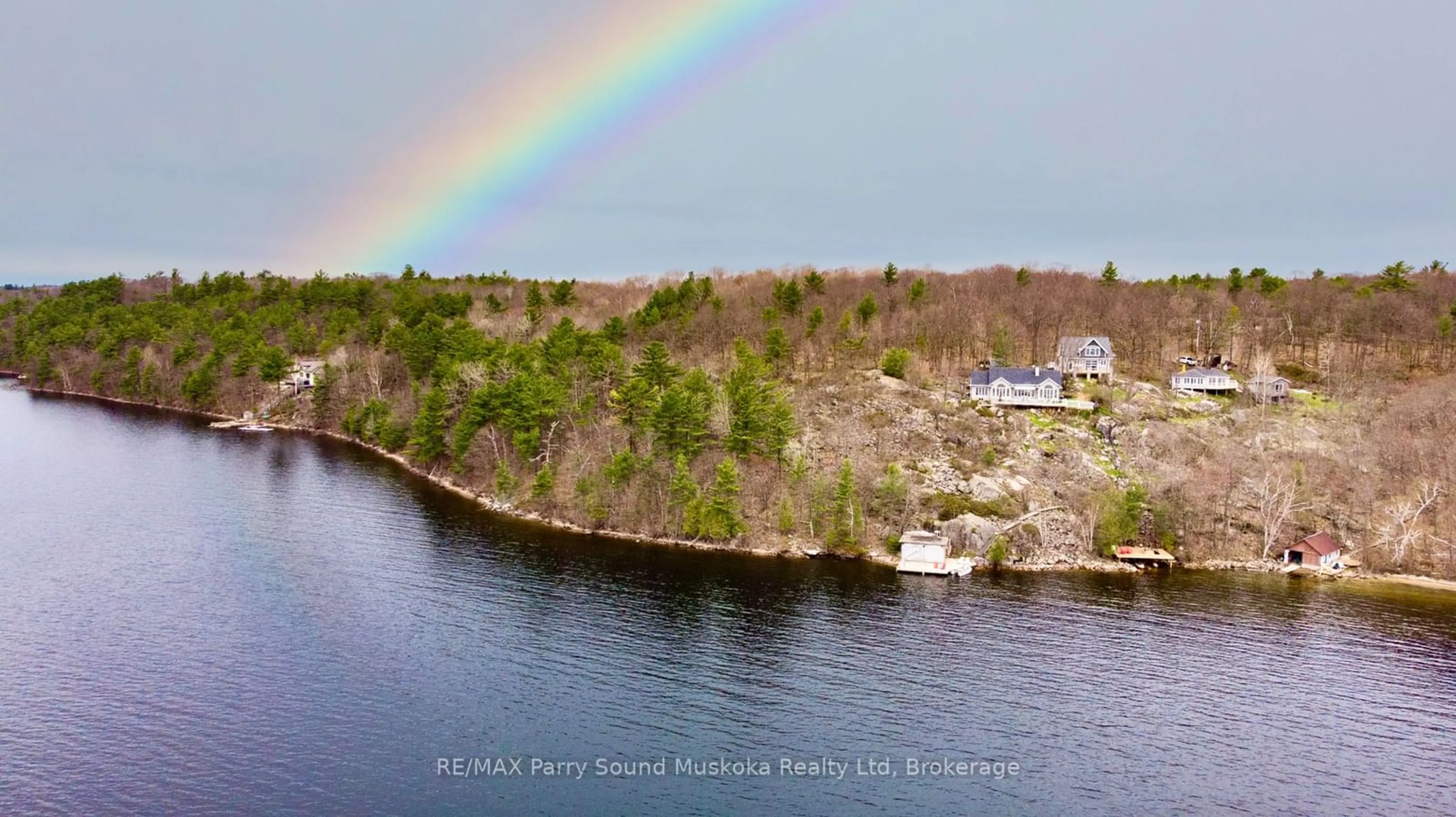 A pic from outside/outdoor area/front of a property/back of a property/a pic from drone, water/lake/river/ocean view for 37 Maurys Run, Carling Ontario P0G 1G0