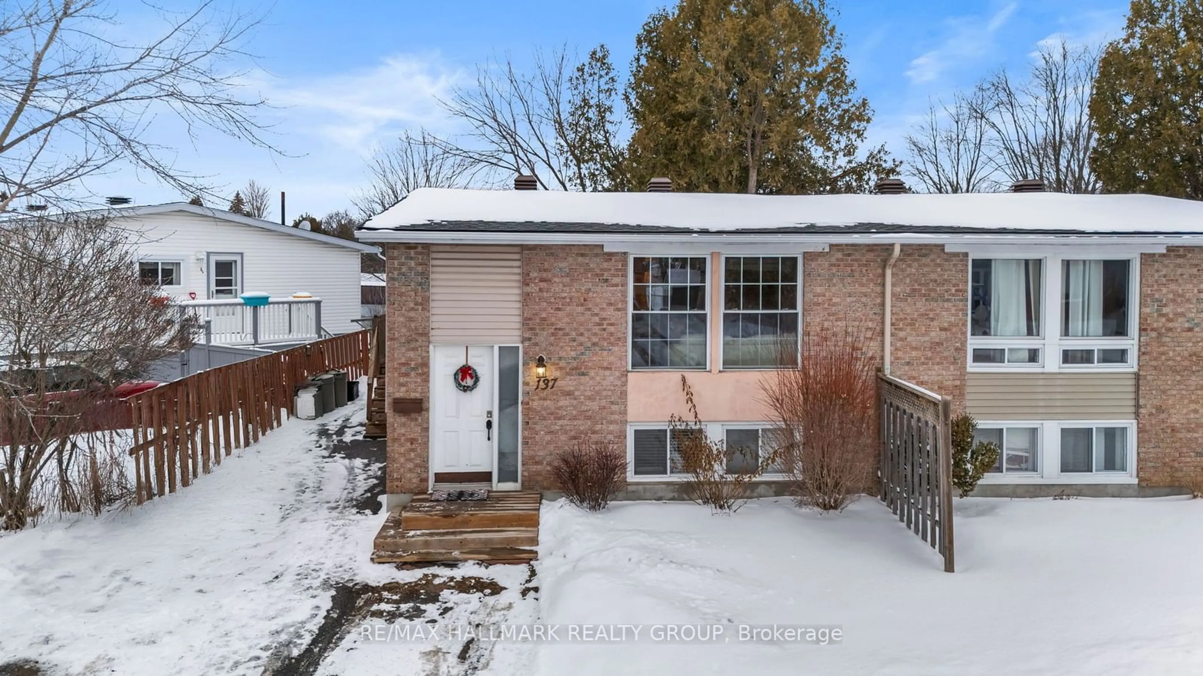 Home with brick exterior material, street for 137 Glamorgan Dr, Kanata Ontario K2L 1R7