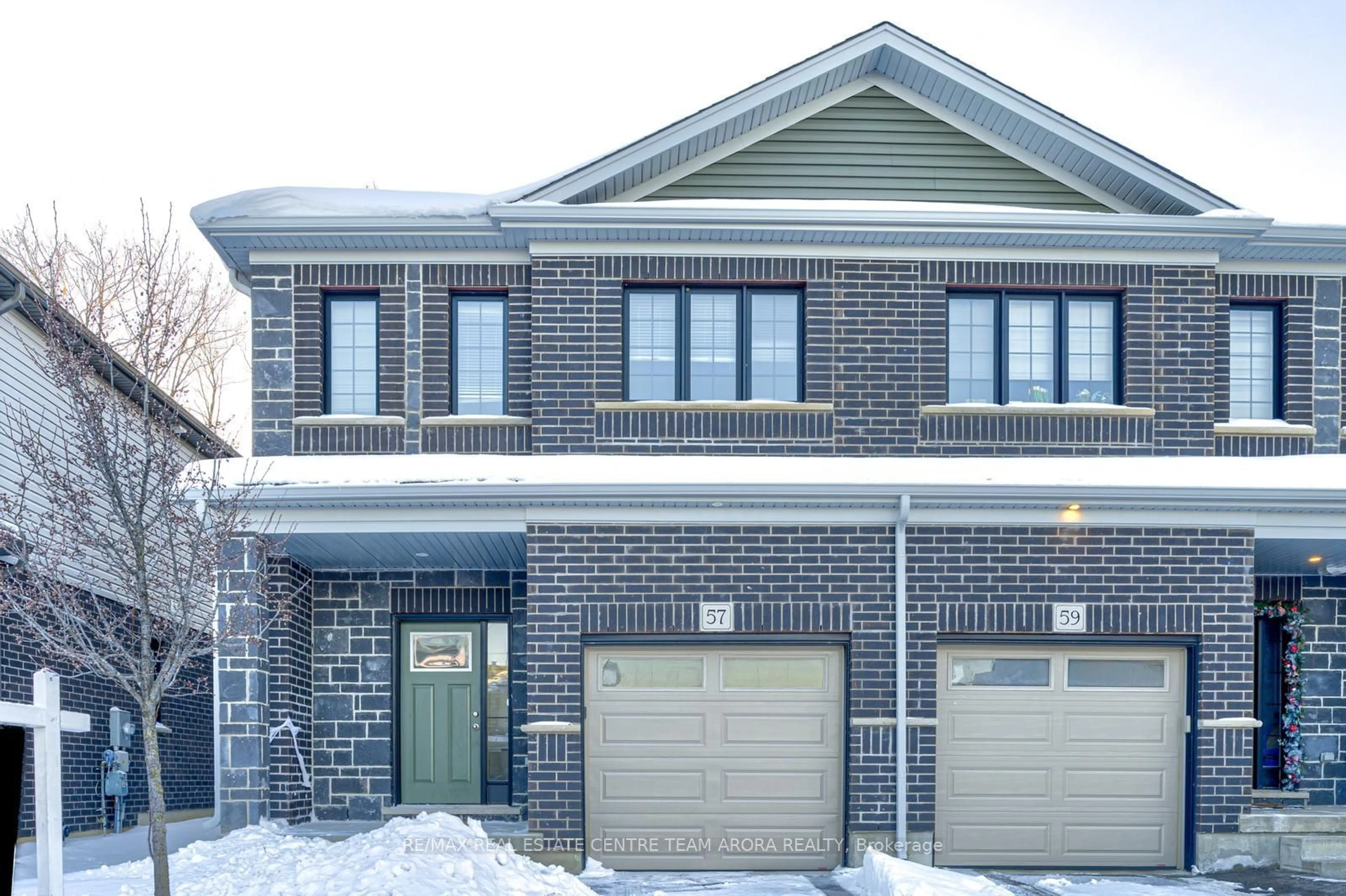 Home with brick exterior material, street for 57 Woodedge Circ, Kitchener Ontario N2R 0P8