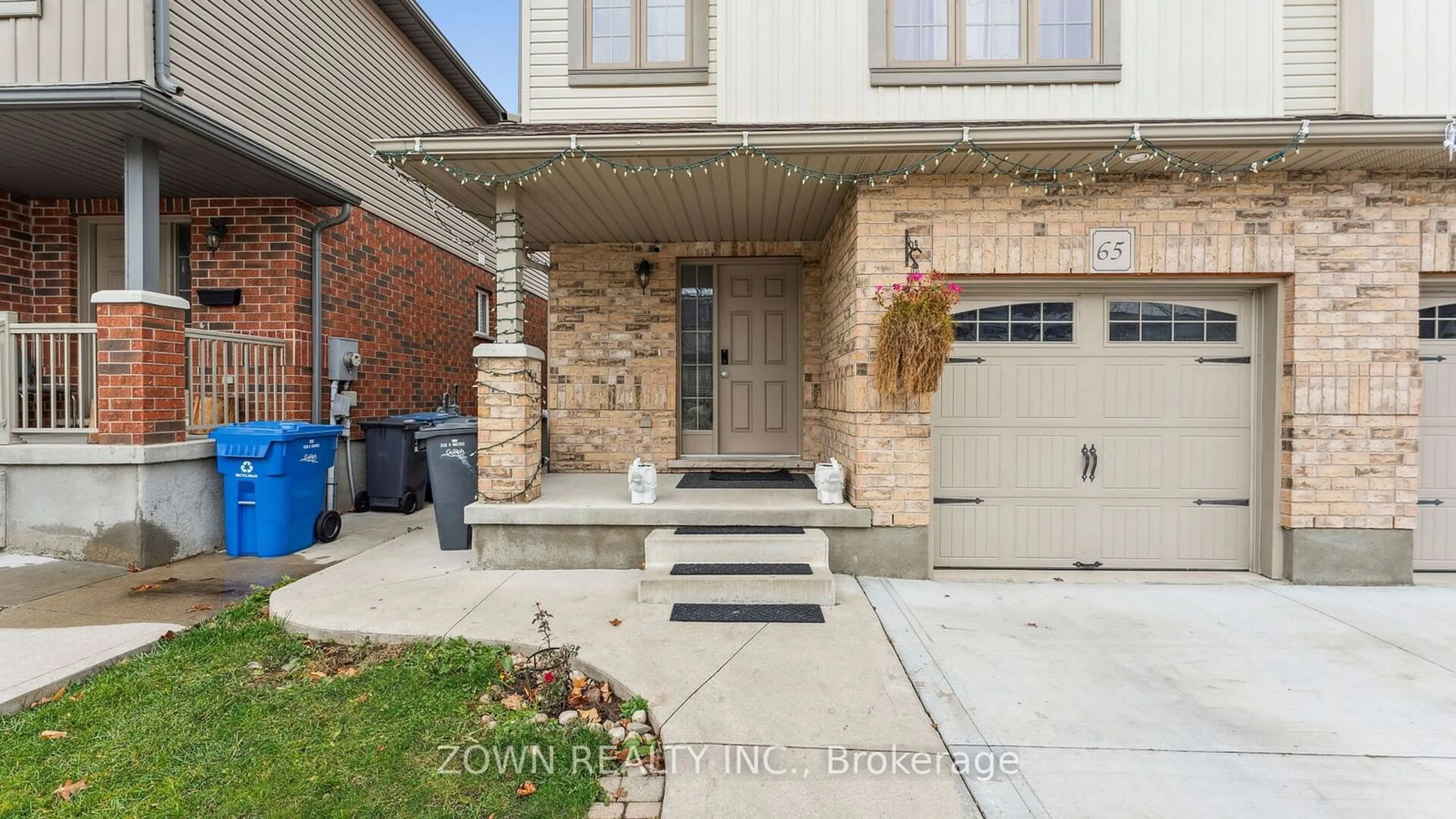 Home with brick exterior material, street for 65 Curzon Cres, Guelph Ontario N1K 0B2