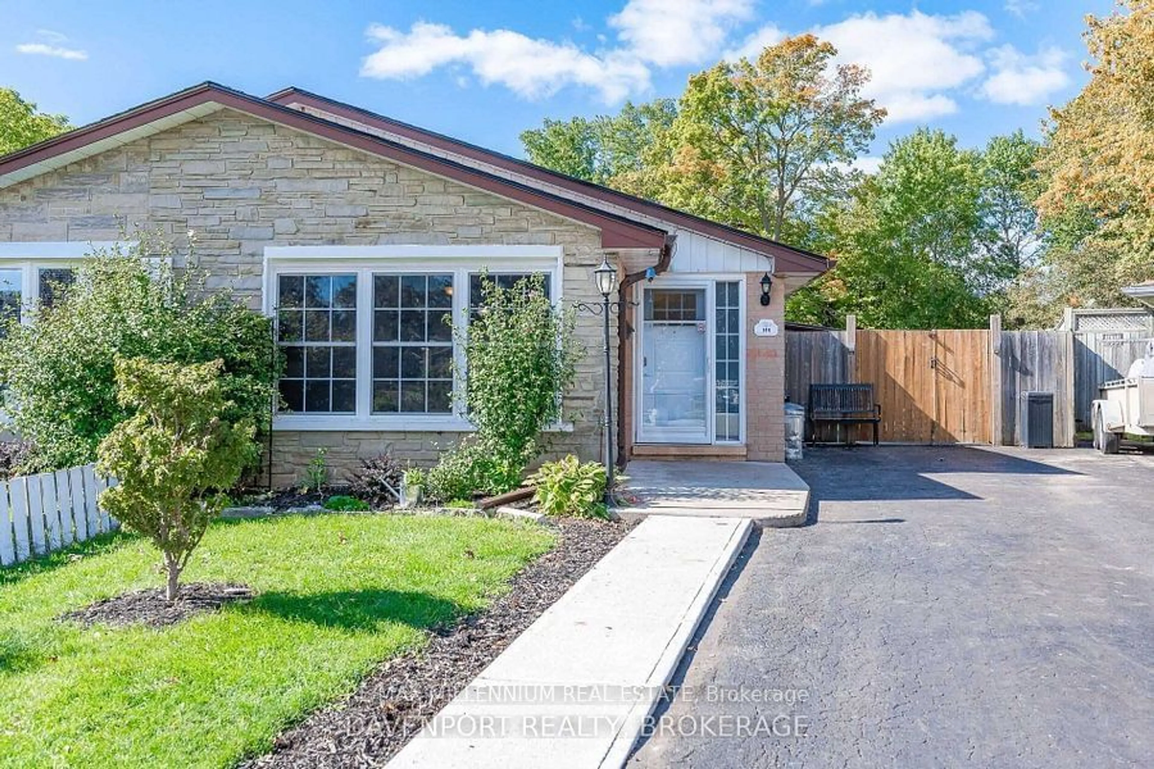 Home with brick exterior material, street for 144 Markwood Dr, Kitchener Ontario N2M 2H6