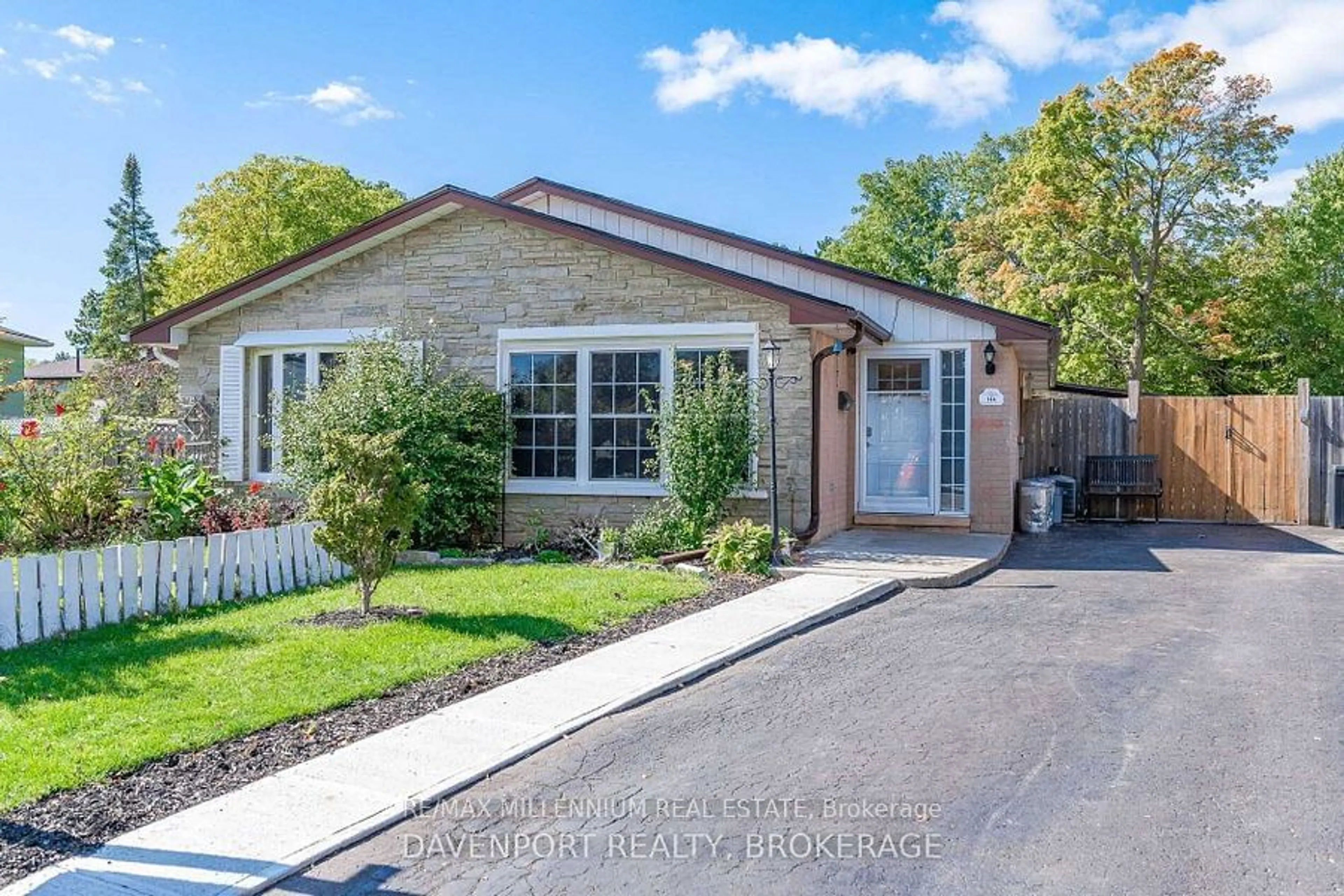 Home with brick exterior material, street for 144 Markwood Dr, Kitchener Ontario N2M 2H6