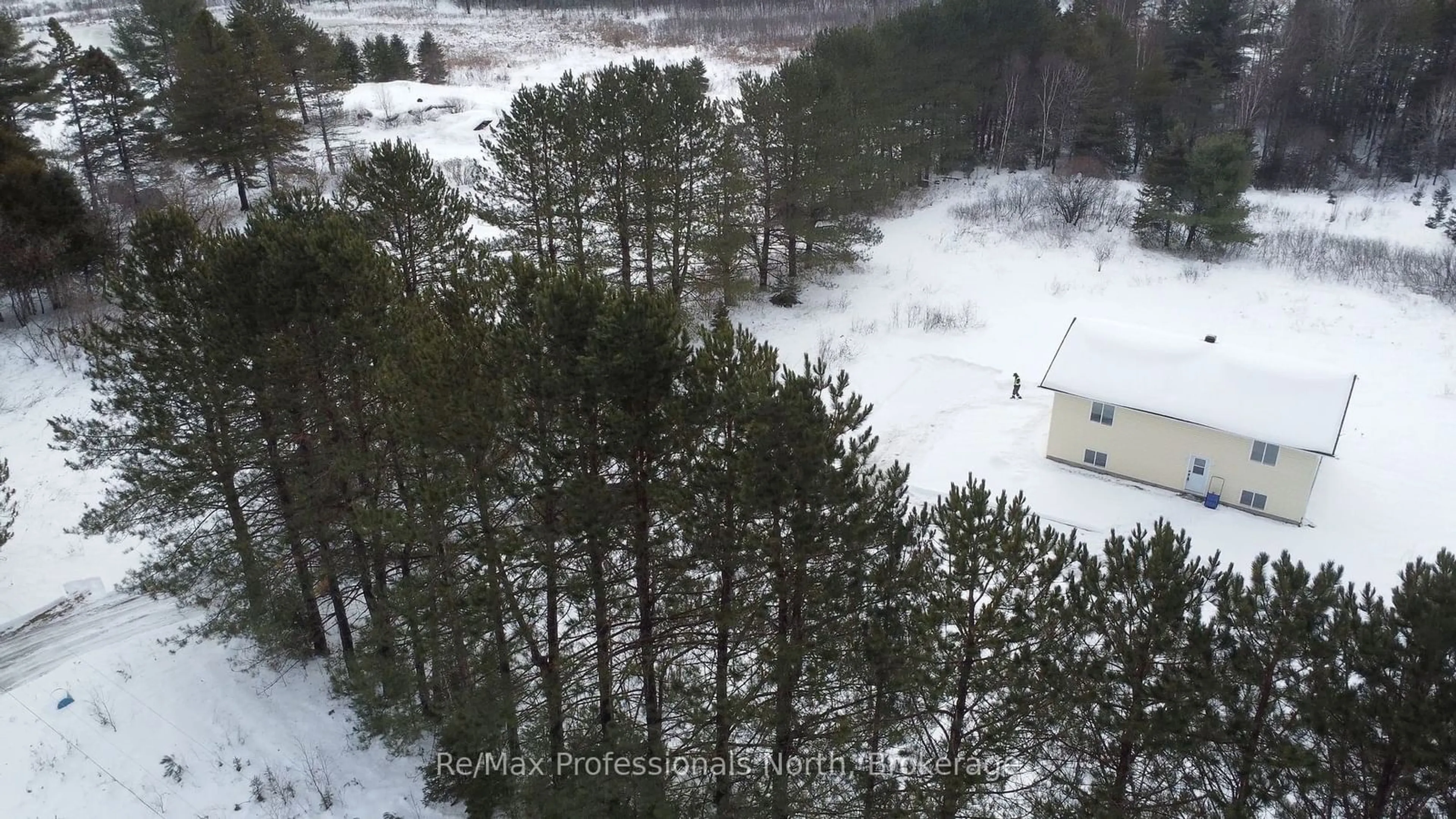 A pic from outside/outdoor area/front of a property/back of a property/a pic from drone, forest/trees view for 46 Laurin Rd, West Nipissing Ontario P0H 2M0