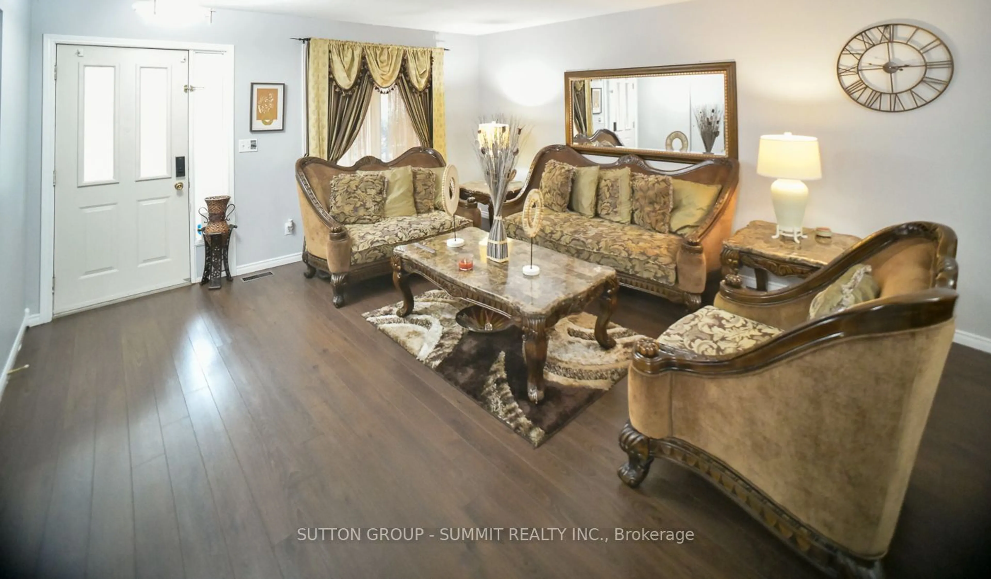 Living room with furniture, wood/laminate floor for 15 Turquoise Crt, Chatham-Kent Ontario N7M 6G8