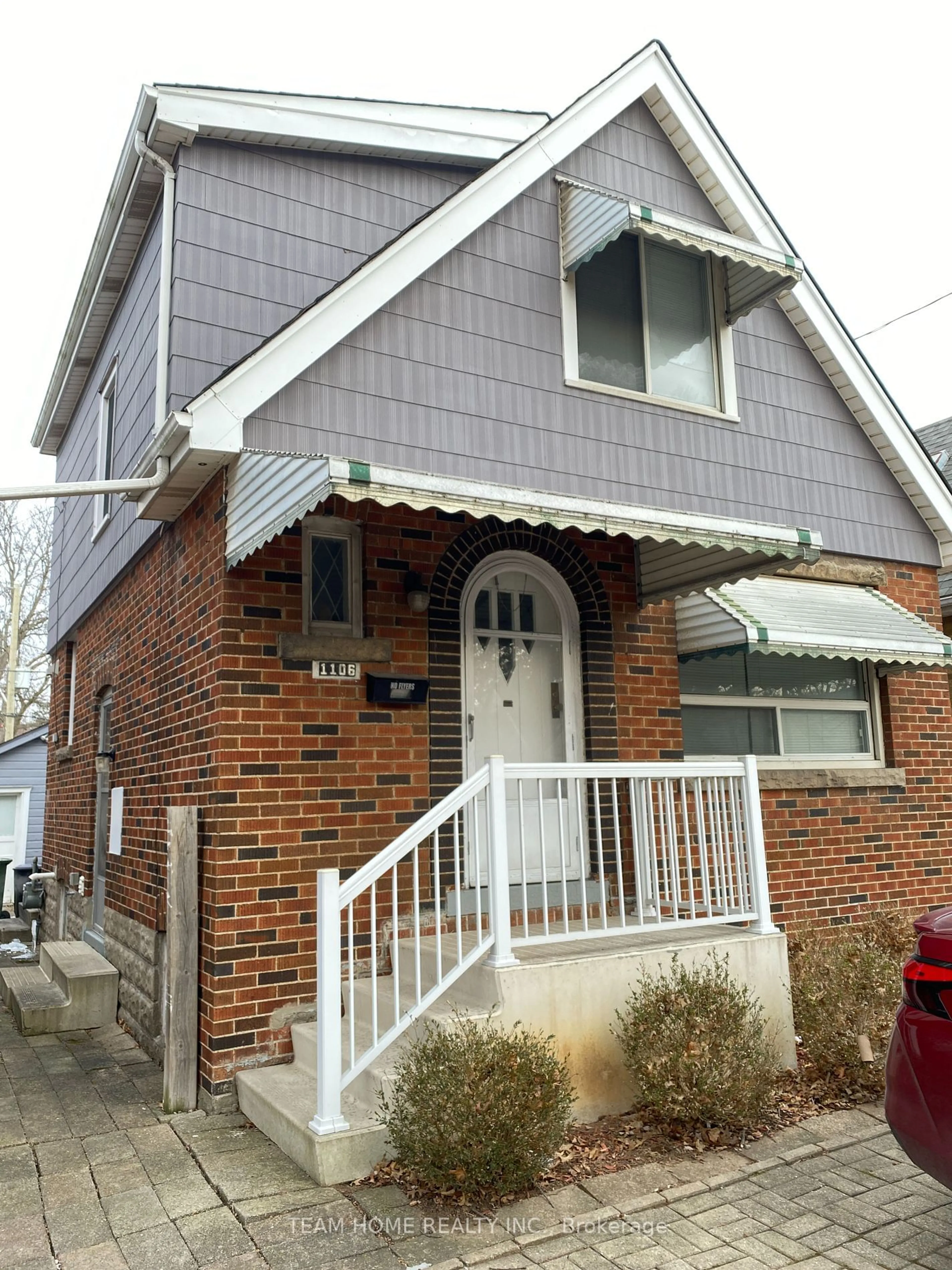 Home with brick exterior material, street for 1106 King St, Hamilton Ontario L8S 1L7