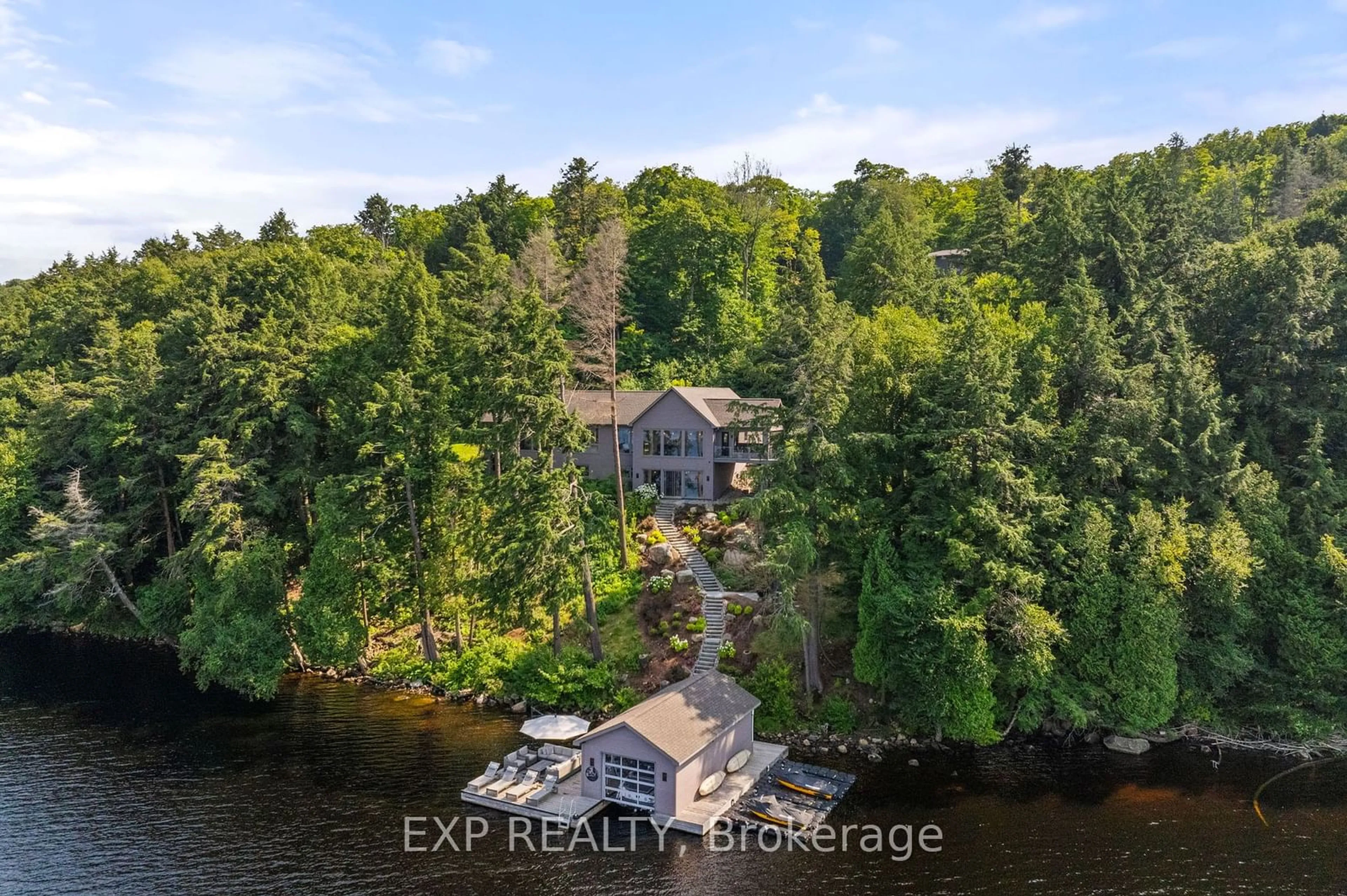 A pic from outside/outdoor area/front of a property/back of a property/a pic from drone, water/lake/river/ocean view for 124 Claren Cres, Huntsville Ontario P1H 2J2