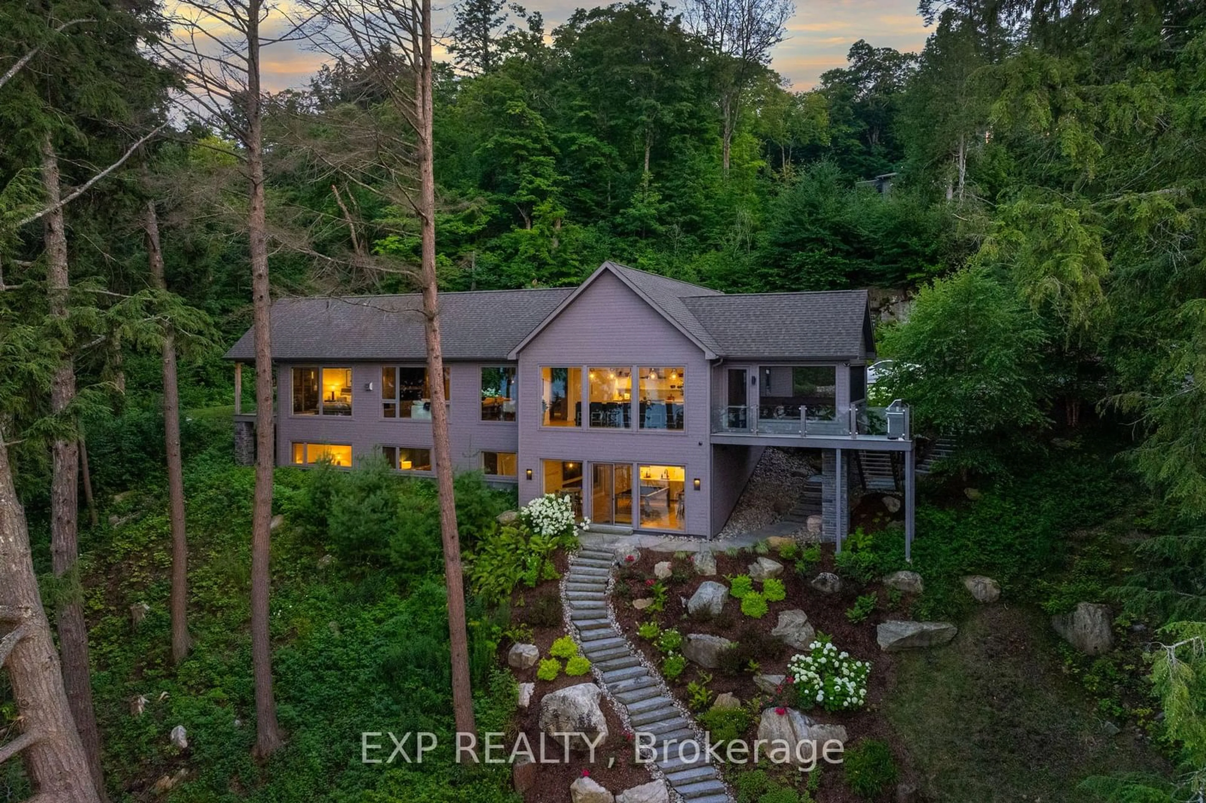 A pic from outside/outdoor area/front of a property/back of a property/a pic from drone, water/lake/river/ocean view for 124 Claren Cres, Huntsville Ontario P1H 2J2