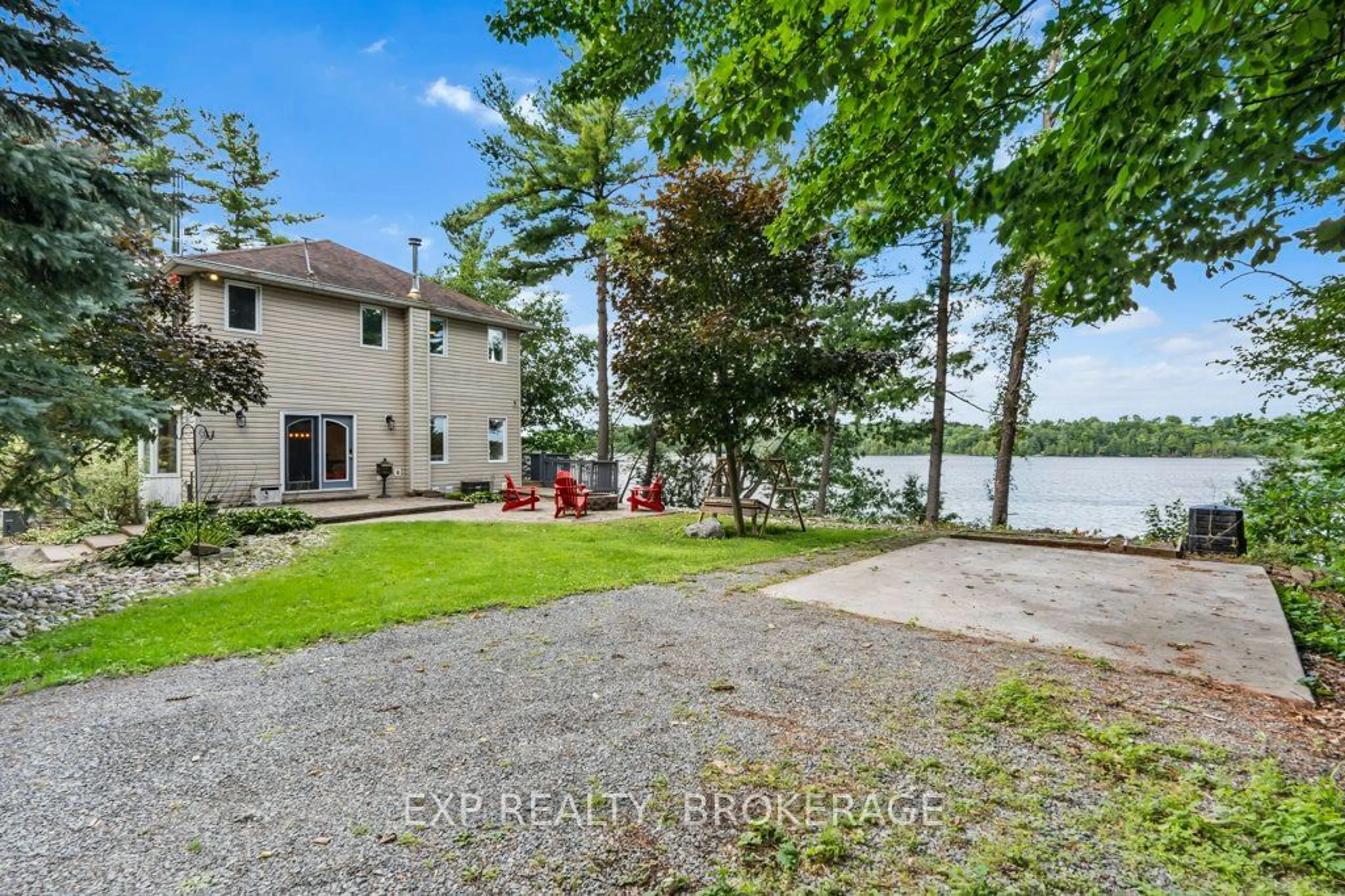 A pic from outside/outdoor area/front of a property/back of a property/a pic from drone, water/lake/river/ocean view for 1403A EVERETT Lane, South Frontenac Ontario K0H 2T0