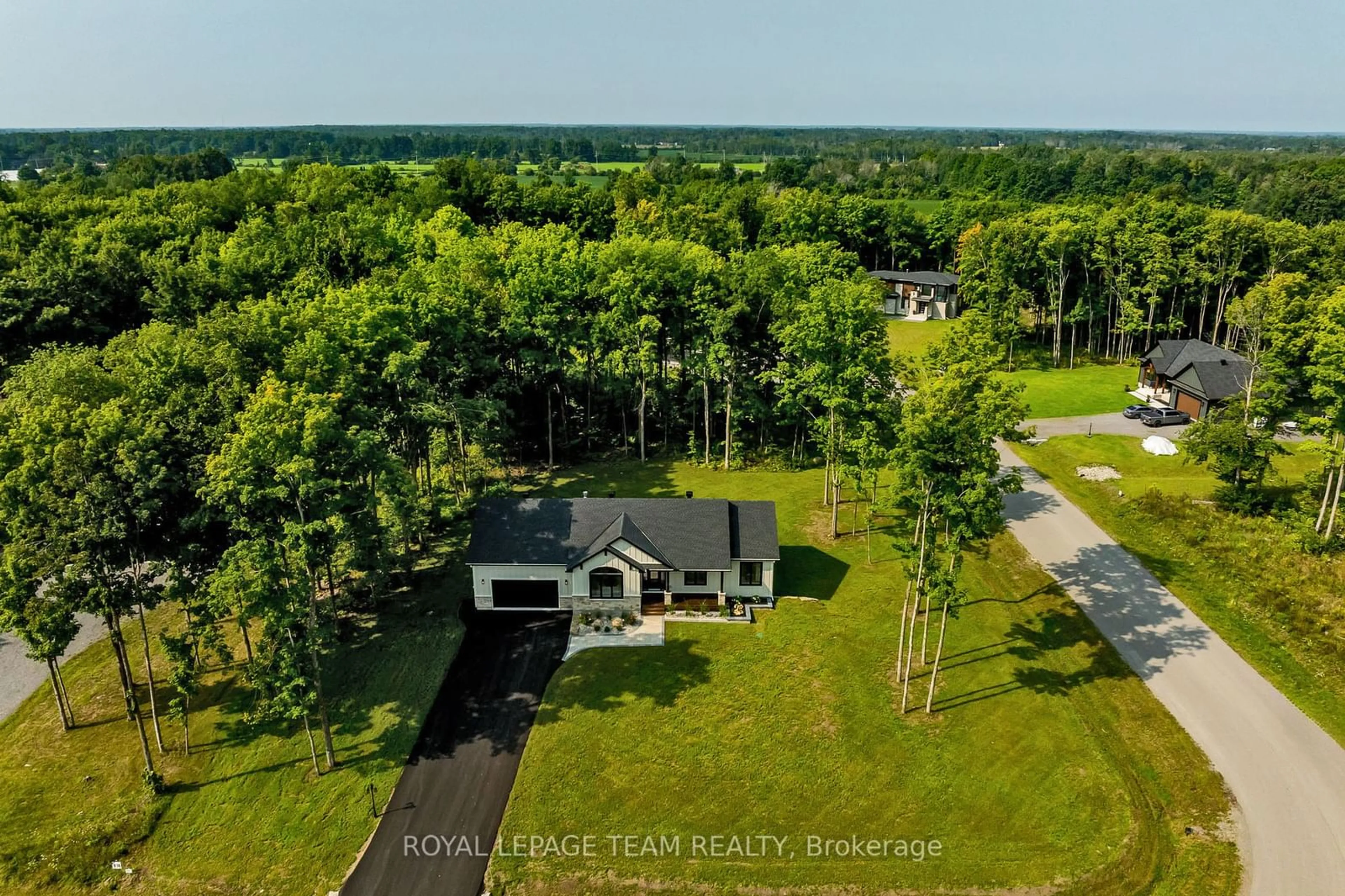 A pic from outside/outdoor area/front of a property/back of a property/a pic from drone, water/lake/river/ocean view for 5 Comeau Crt, North Grenville Ontario K0G 1J0