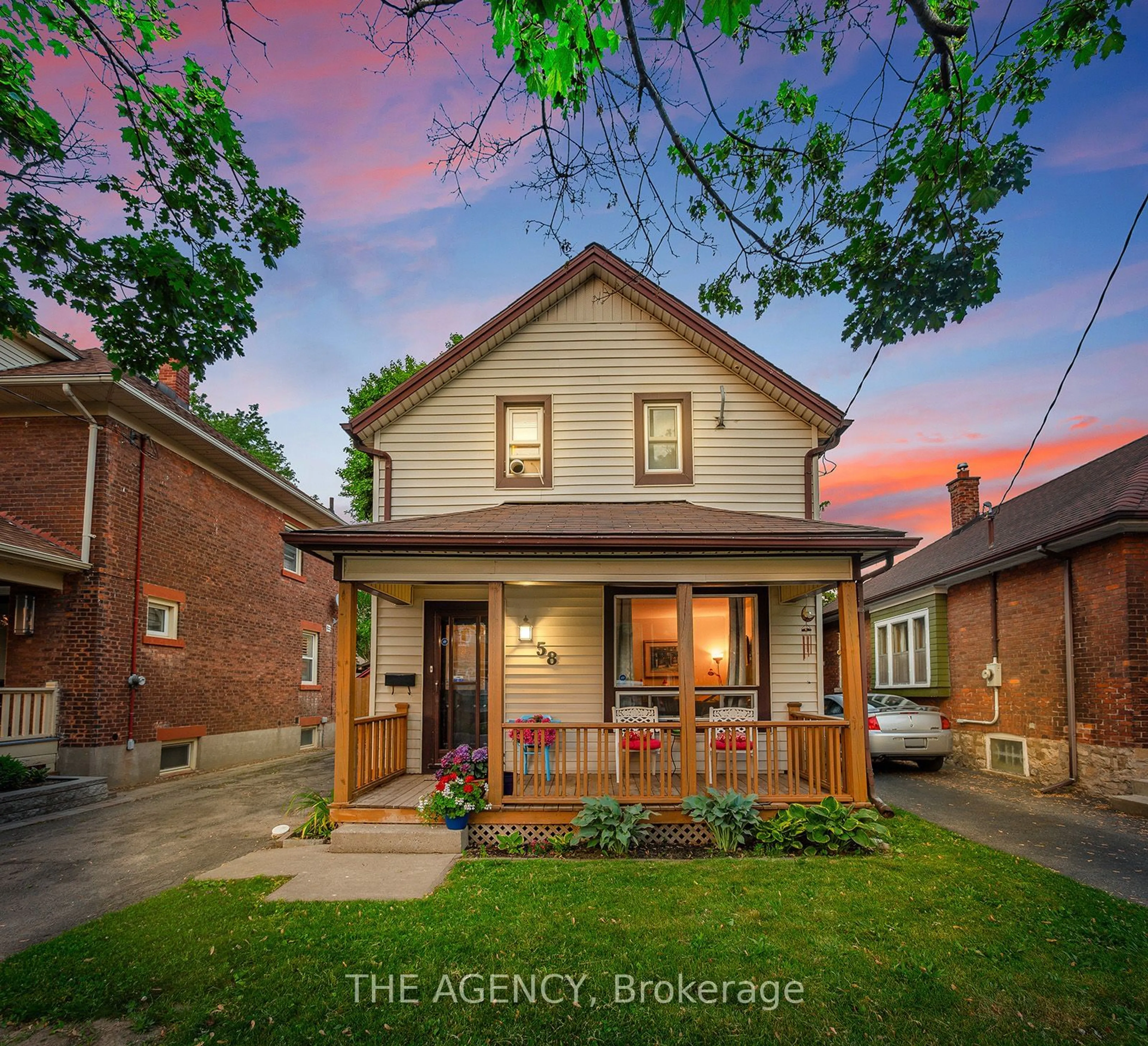 Home with brick exterior material, street for 58 Woodland Ave, St. Catharines Ontario L2R 5A3