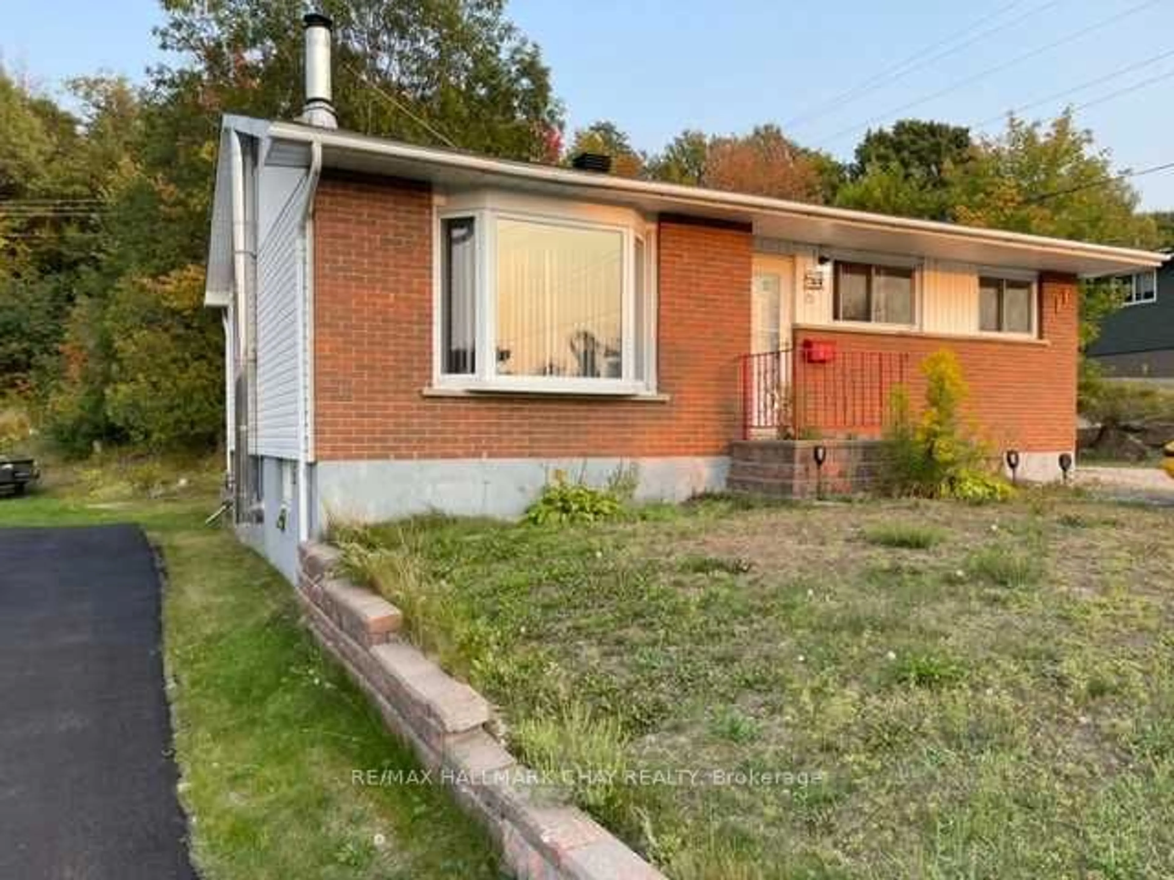 Home with brick exterior material, street for 85 Mississauga Ave, Elliot Lake Ontario P5A 1E1