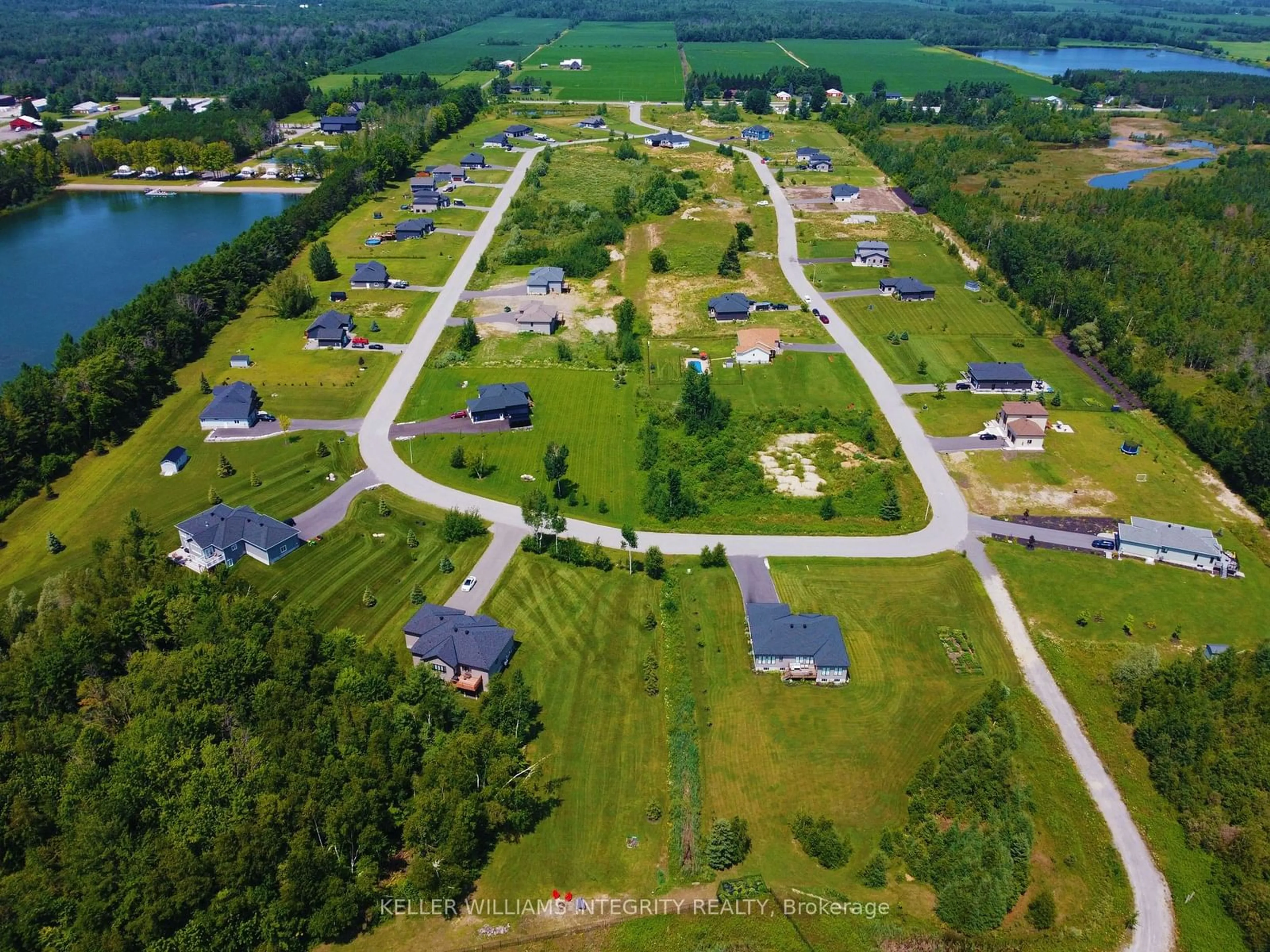 A pic from outside/outdoor area/front of a property/back of a property/a pic from drone, unknown for 312 Moore Cres, North Grenville Ontario K0G 1J0