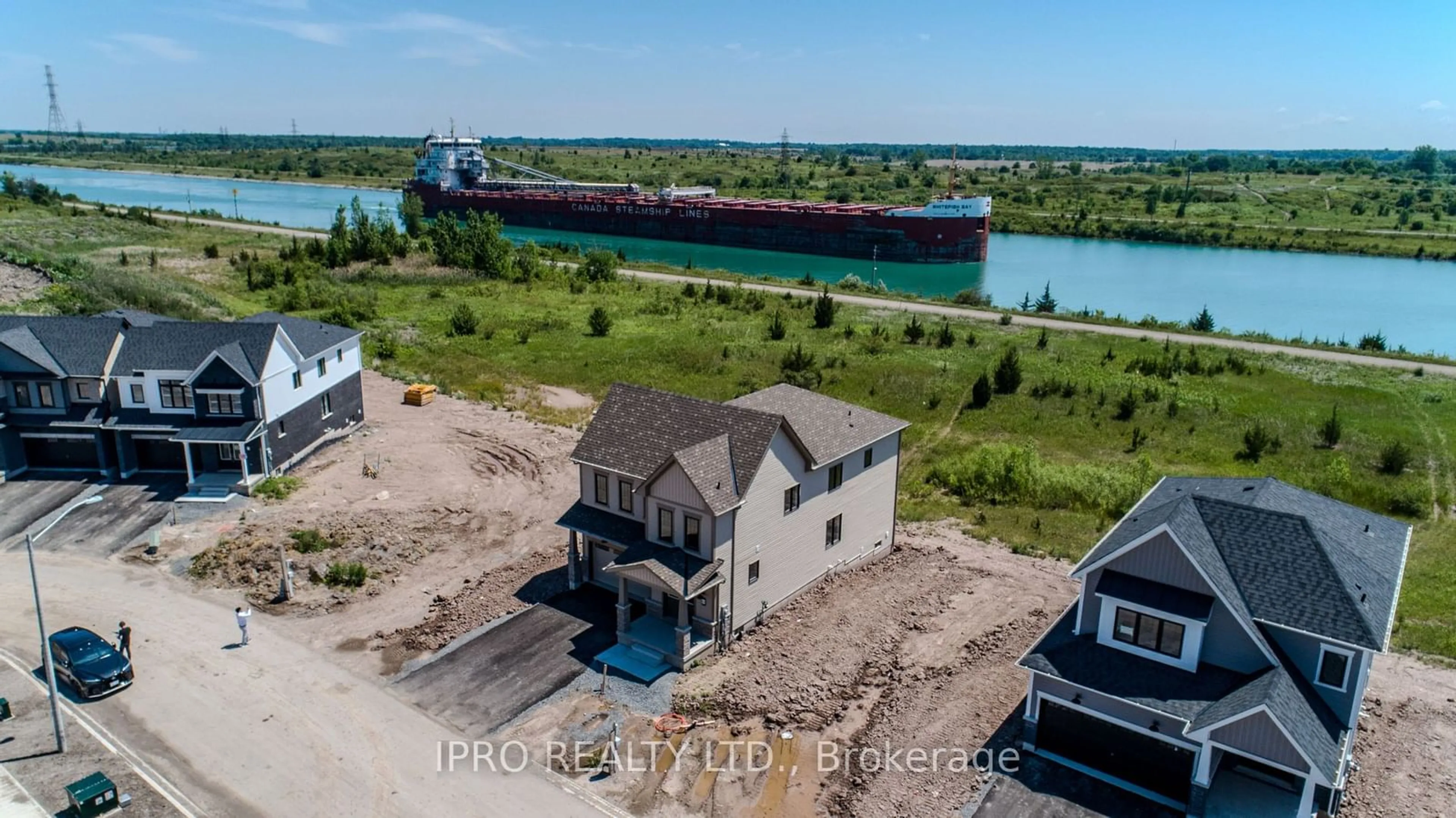 A pic from outside/outdoor area/front of a property/back of a property/a pic from drone, water/lake/river/ocean view for 166 Aviron Cres, Welland Ontario L3B 5K5