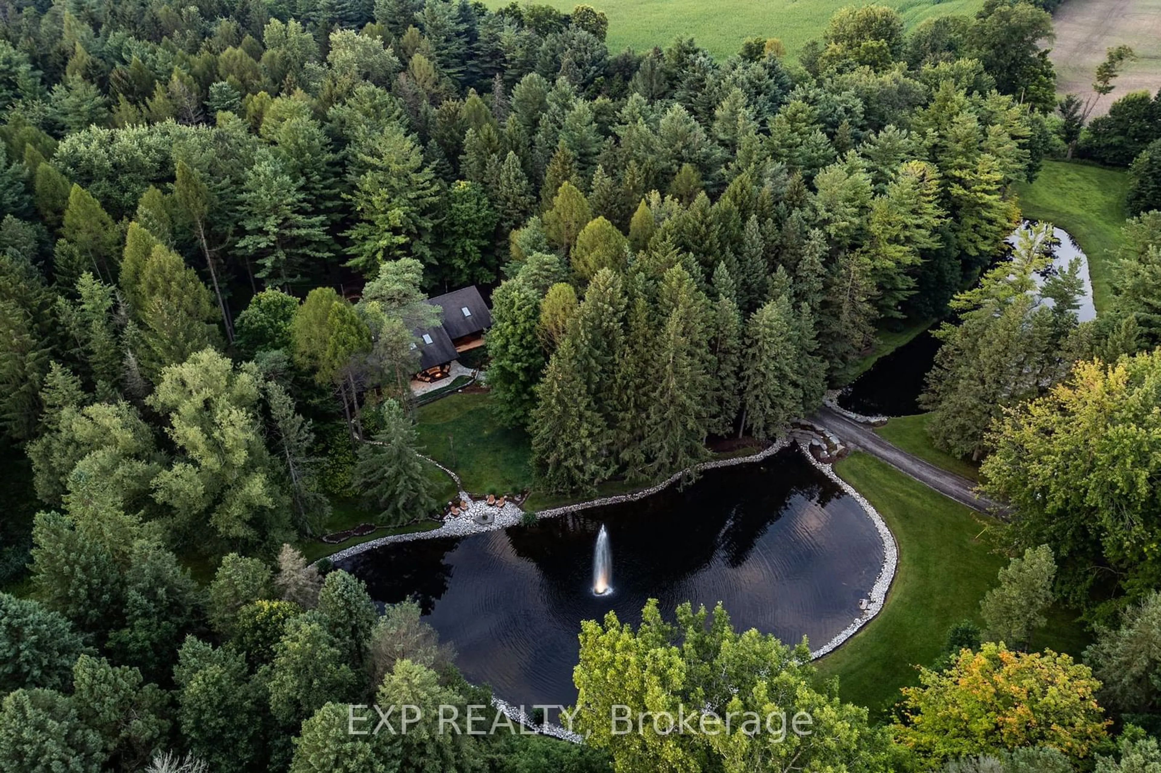 A pic from outside/outdoor area/front of a property/back of a property/a pic from drone, forest/trees view for 10608 Longwoods Rd, Middlesex Centre Ontario N0L 1E0