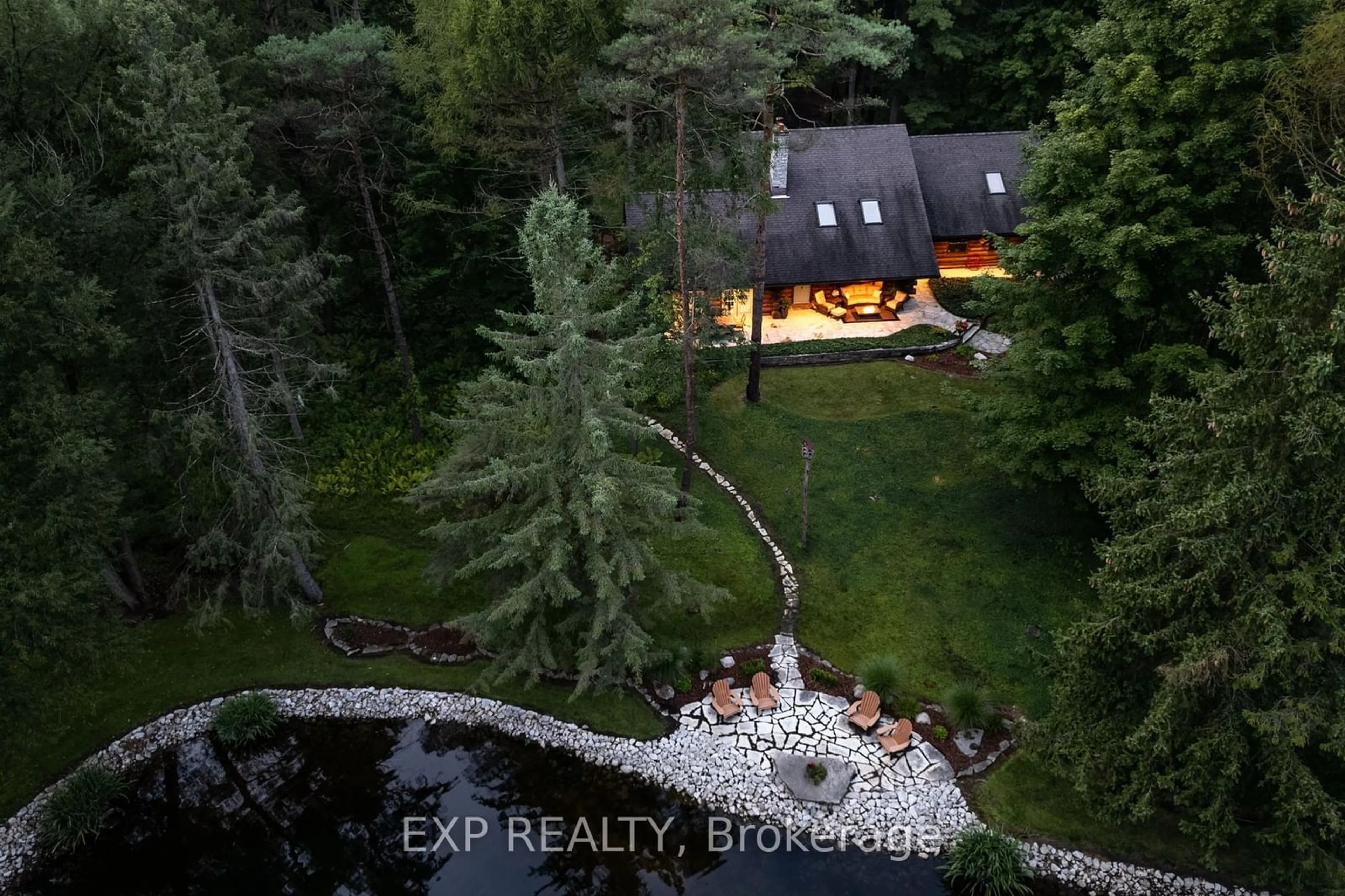 A pic from outside/outdoor area/front of a property/back of a property/a pic from drone, forest/trees view for 10608 Longwoods Rd, Middlesex Centre Ontario N0L 1E0